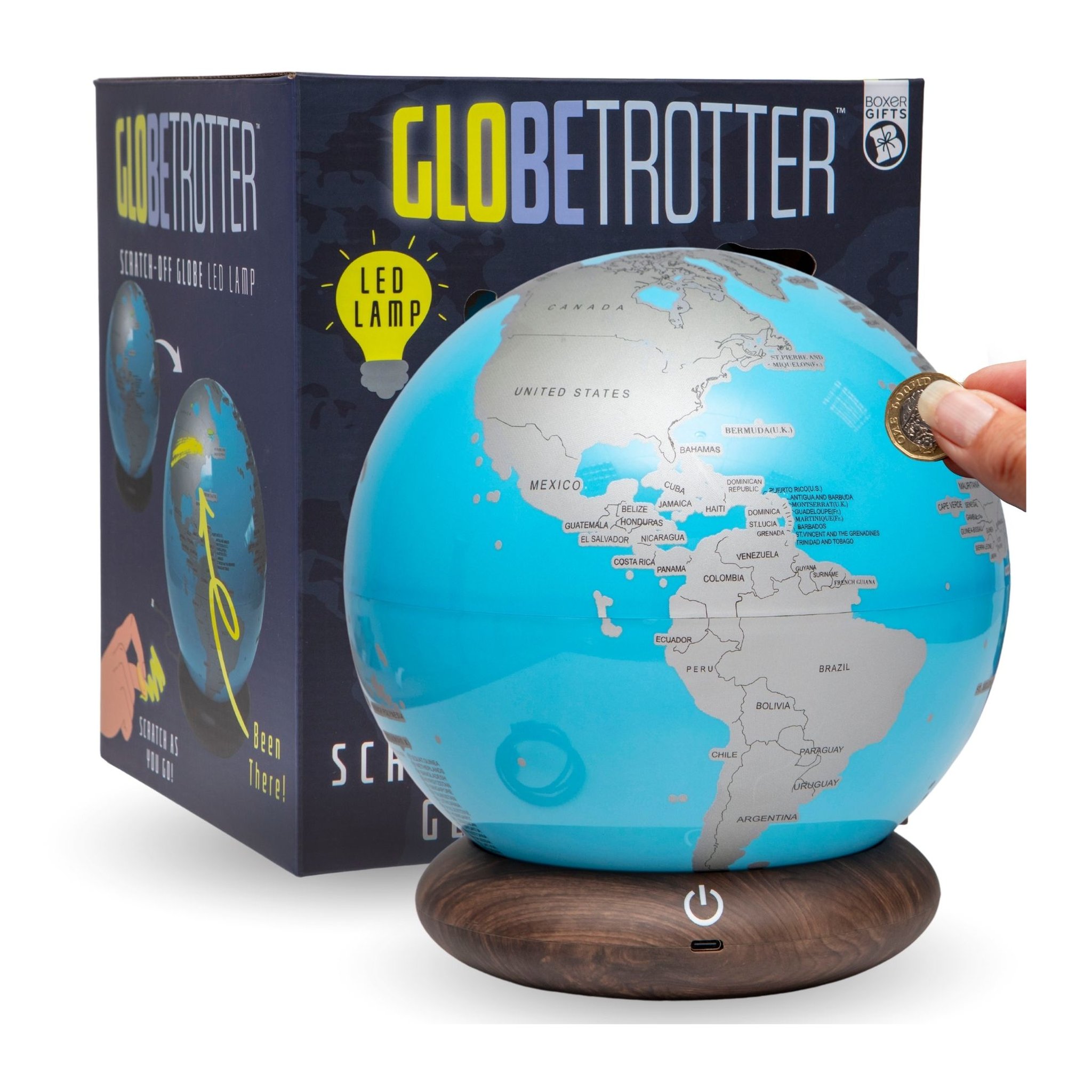 Globe Trotter Rubbel-Globus mit LED-Licht vor der Verpackung, eine Münze rubbelt die silberne Schicht frei