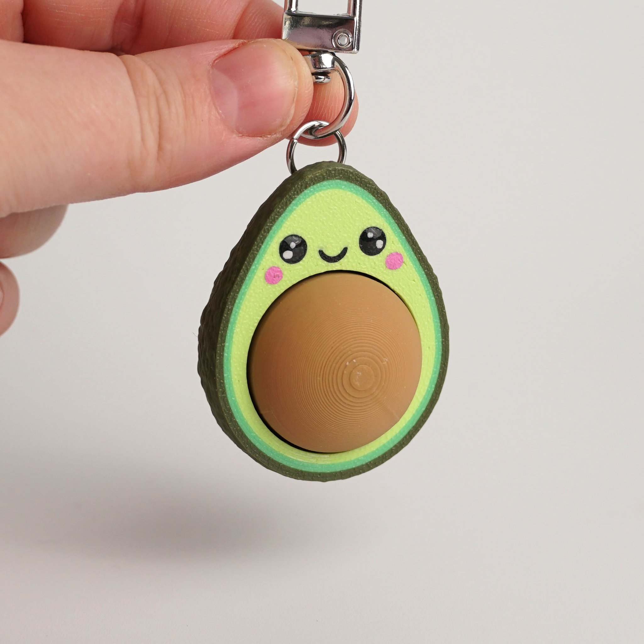 Tukitsu Avocado Clicker Schlüsselanhänger — freistehend ohne Hand