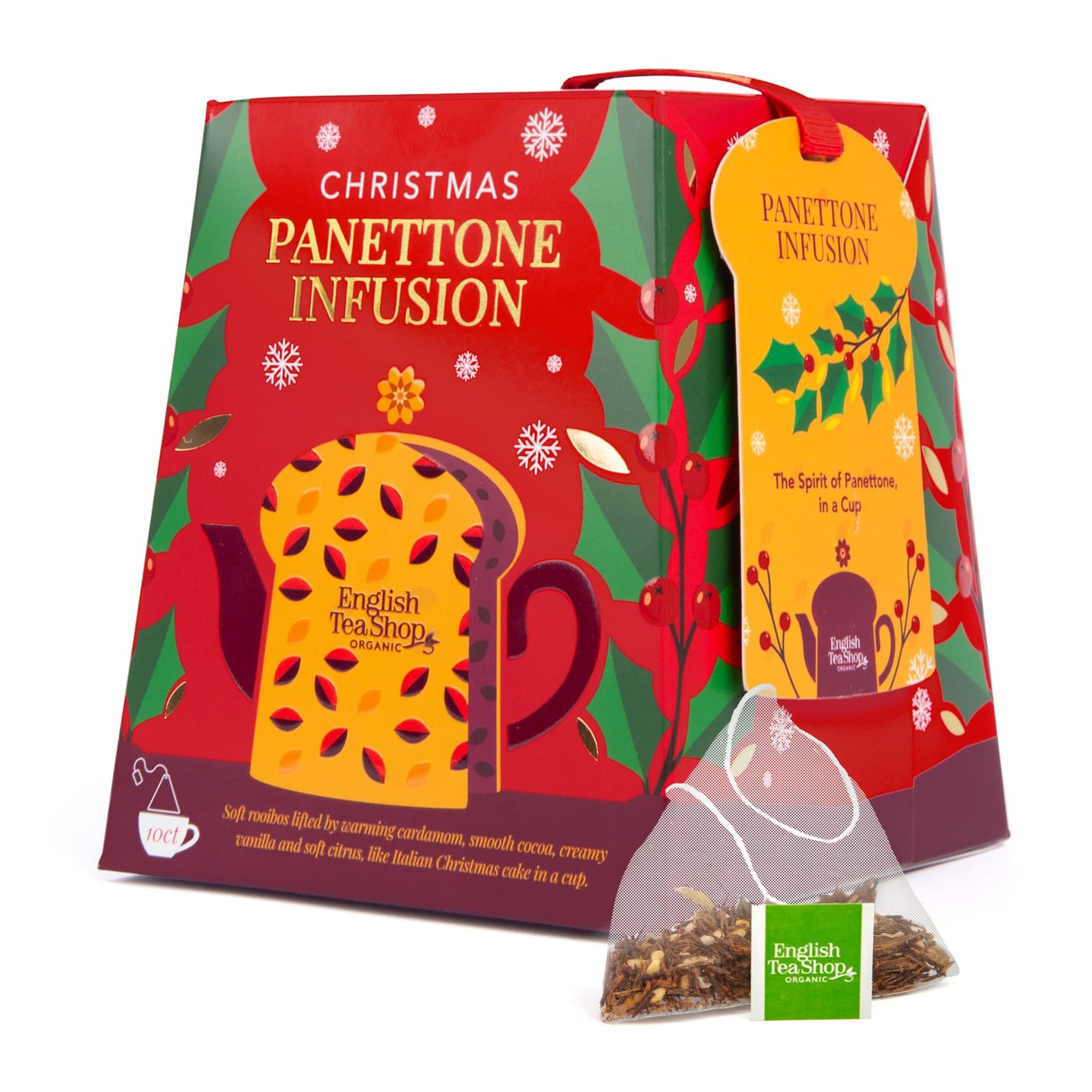 Boîte de thé Panettone avec un sachet pyramide de thé en vrac devant
