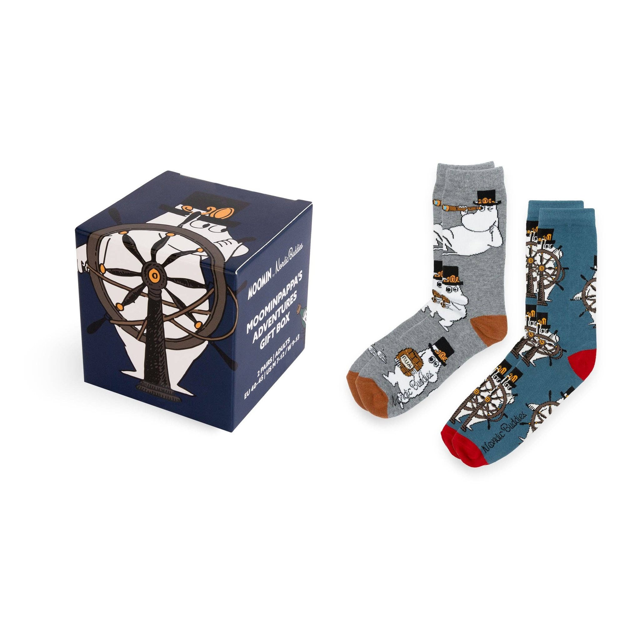 Confezione regalo calze Moomin: due paia accanto alla scatola regalo blu scuro