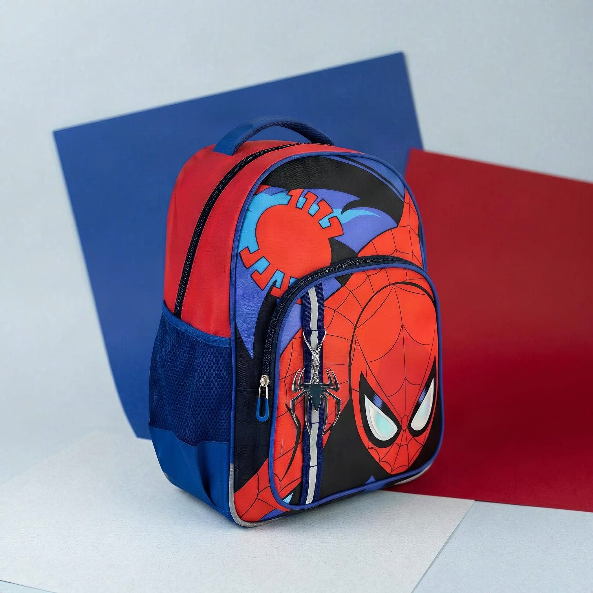 Spider-Man school backpack staged against blue and red backdrops