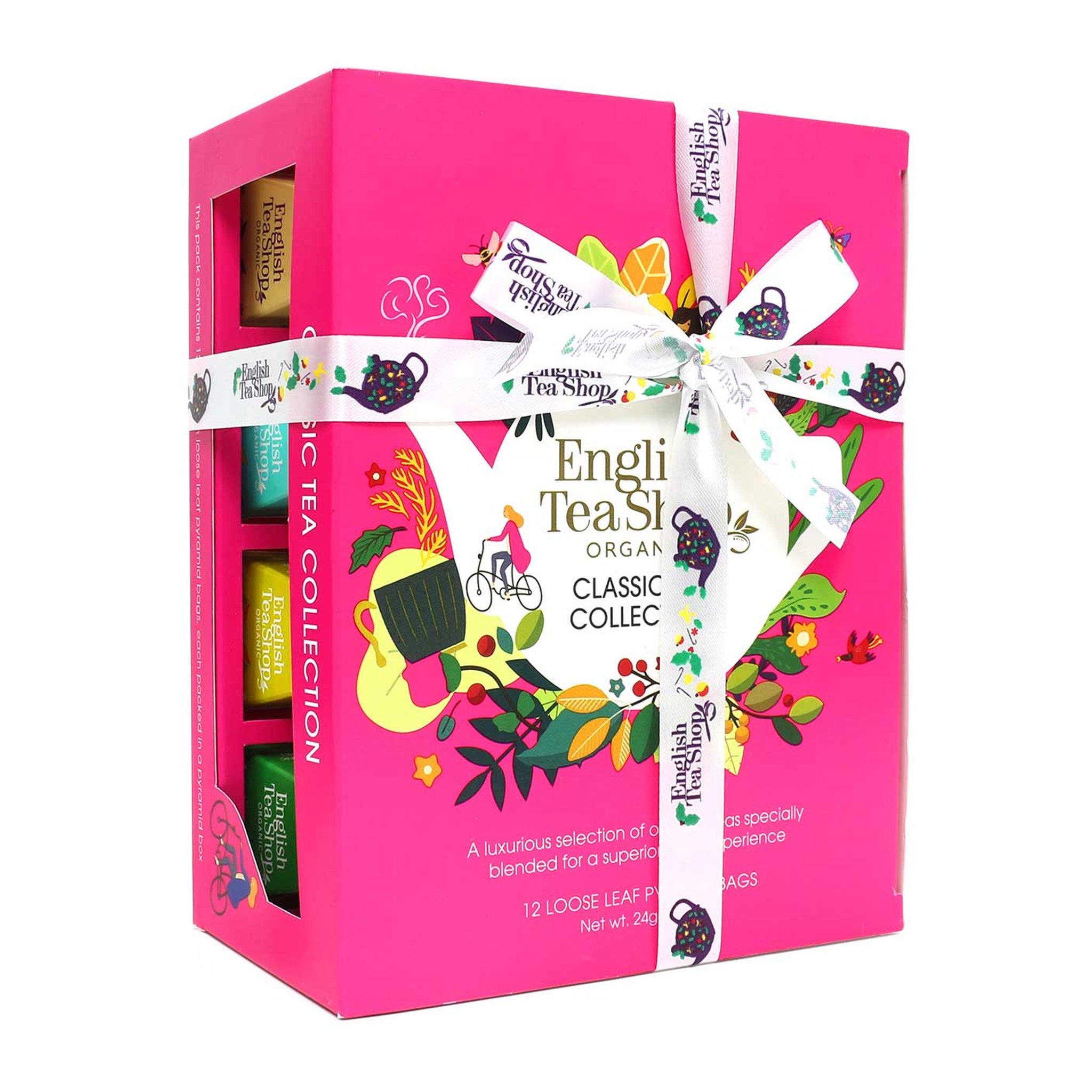 Confezione regalo di tè rosa vista di lato, con le piramidi di tè visibili sul fianco