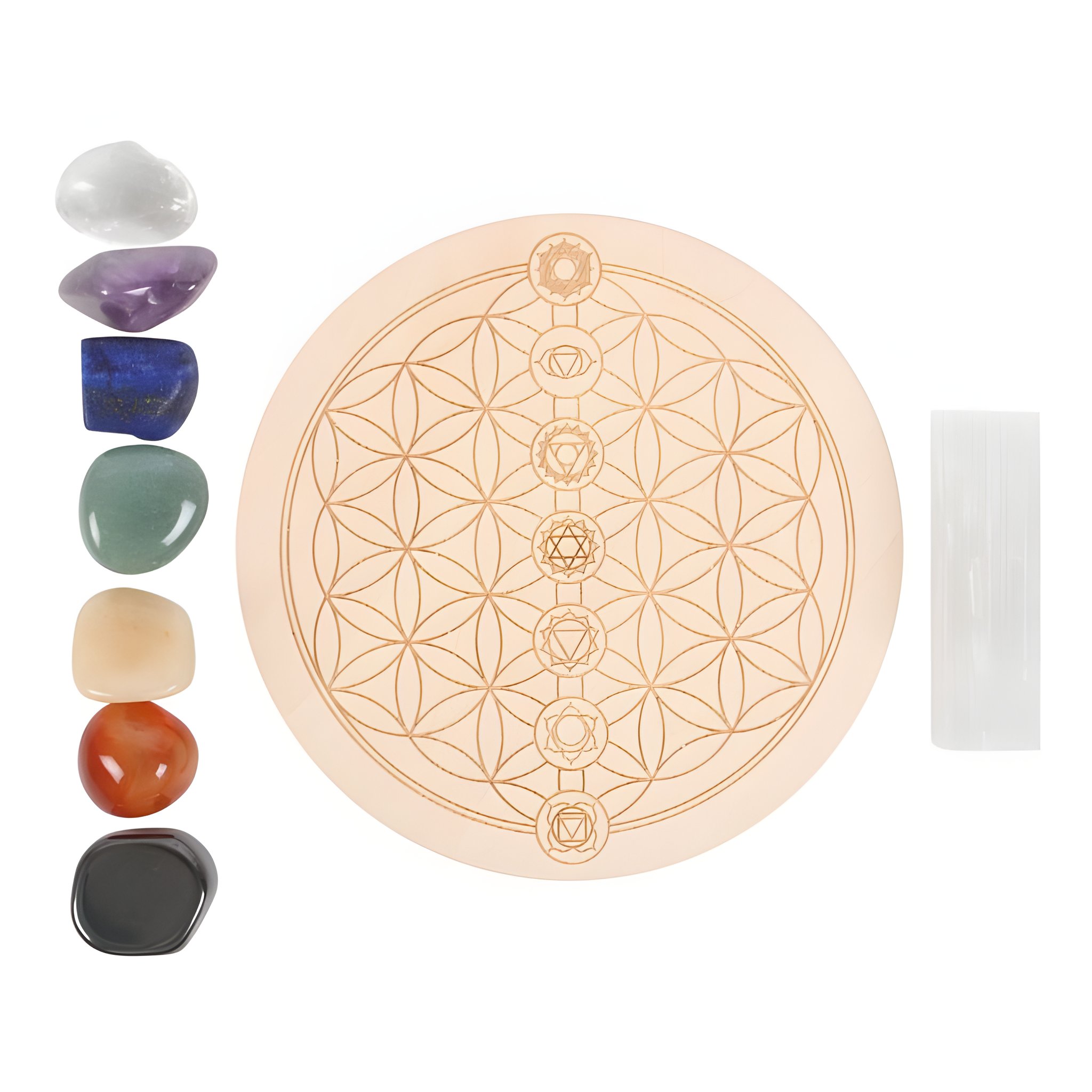 Detail view of the 7 chakra gemstones, wooden crystal grid and selenite wand
