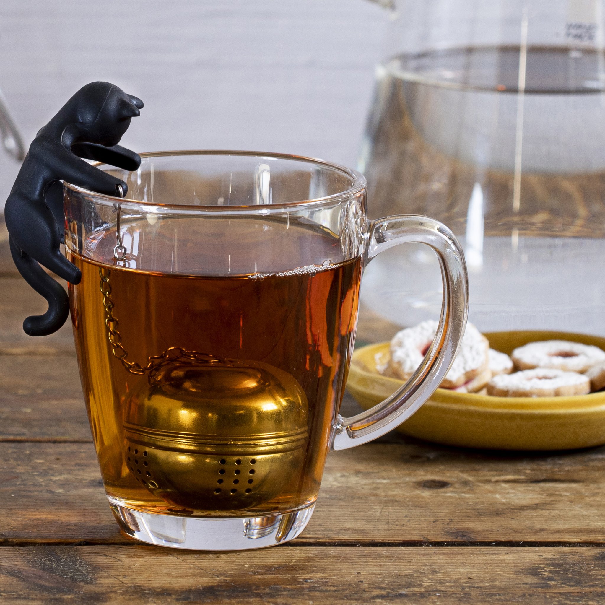 Cattea black silicone cat hanging on glass rim with stainless steel infuser ball