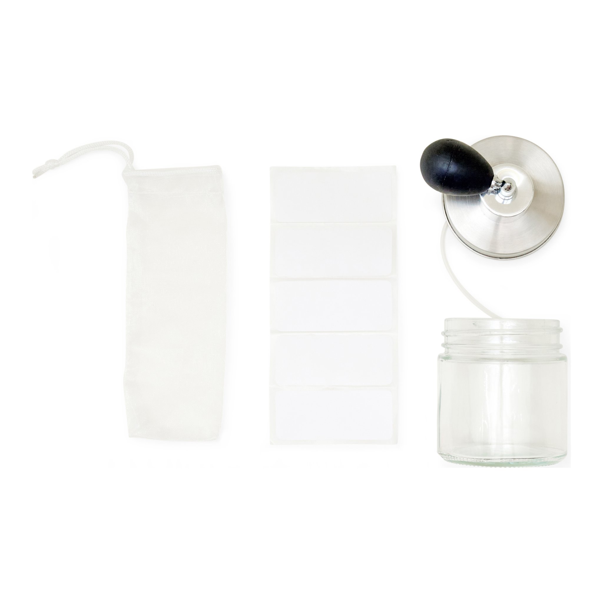 Set-Inhalt: Stoffbeutel, Filterpapiere, Pumpdeckel und Glas