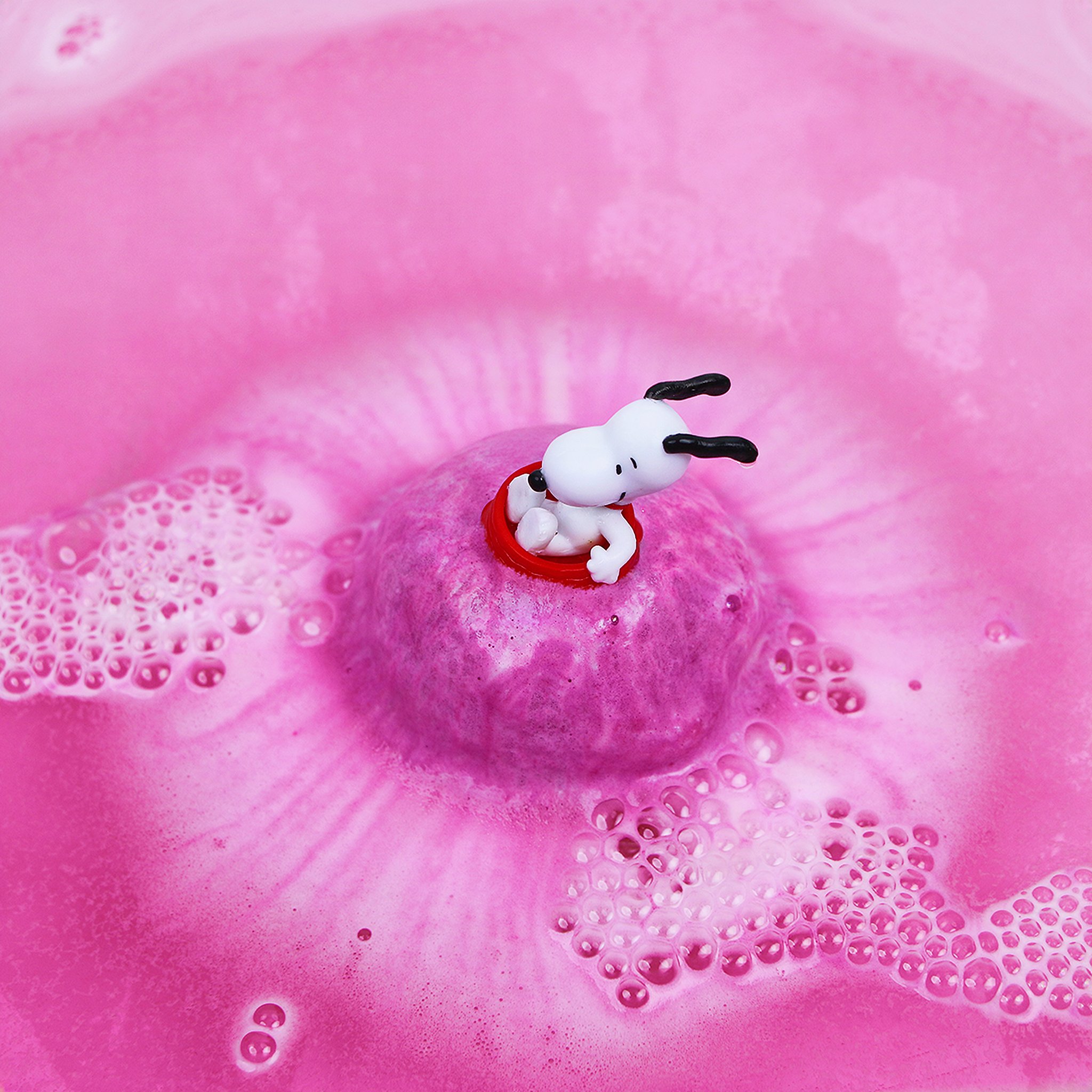 Snoopy figure in pink fizzing bath water