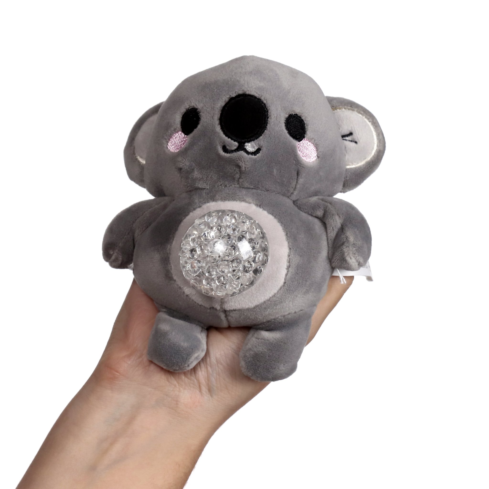 Koala-Plueschstressball in der Hand, Gelkugel tritt hervor