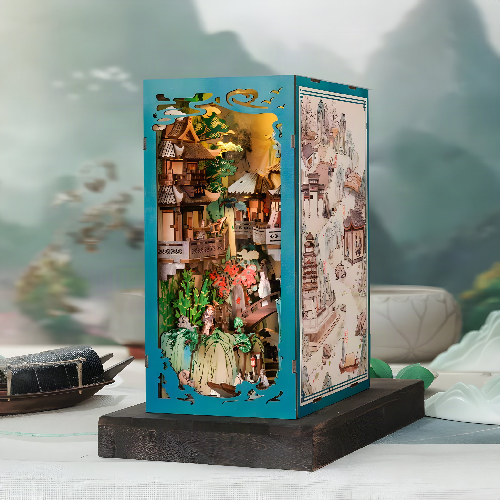 Su Dongpo's Life book nook with turquoise side panels and a lit Chinese landscape