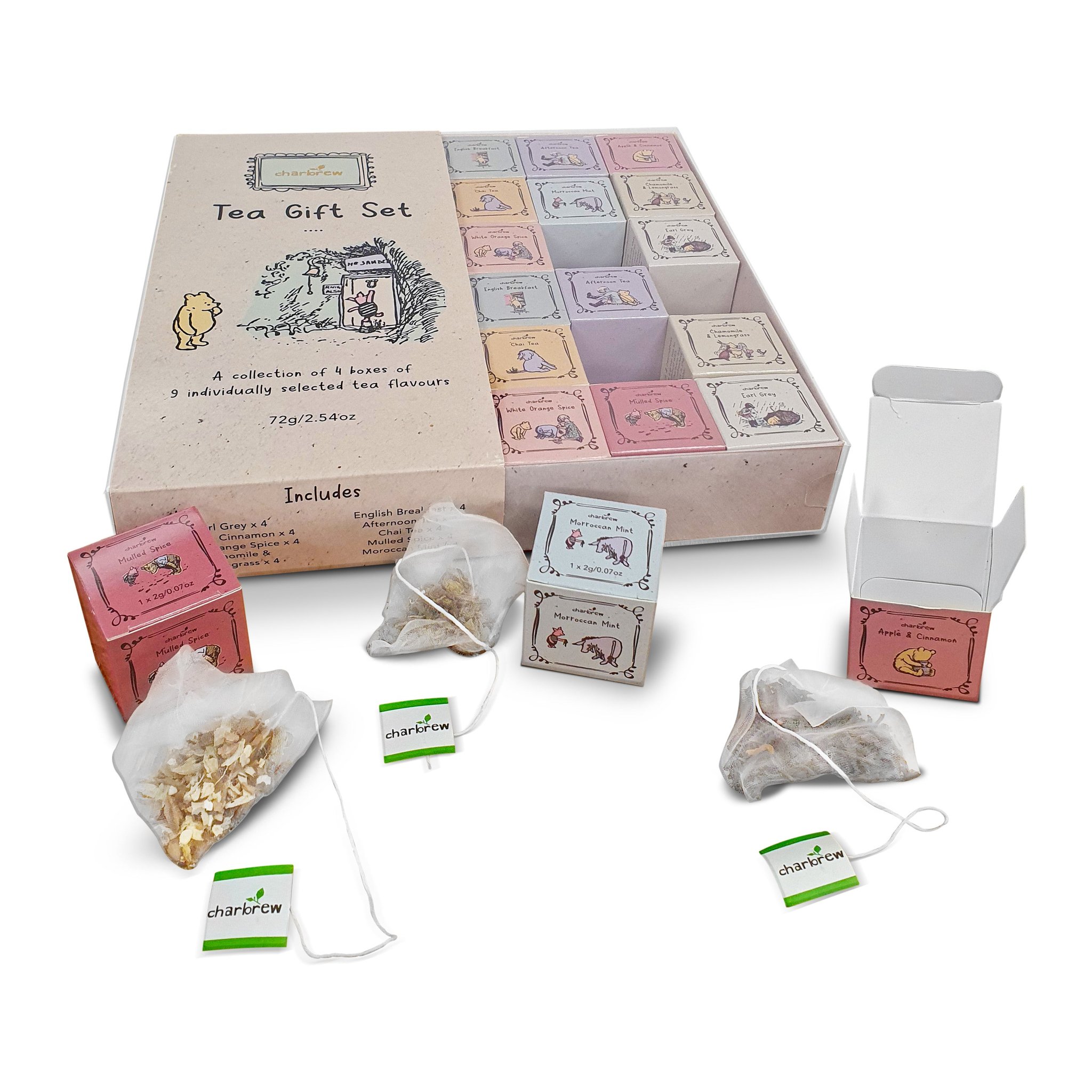 Opened Winnie the Pooh tea set with tea cubes and pyramid tea bags in front