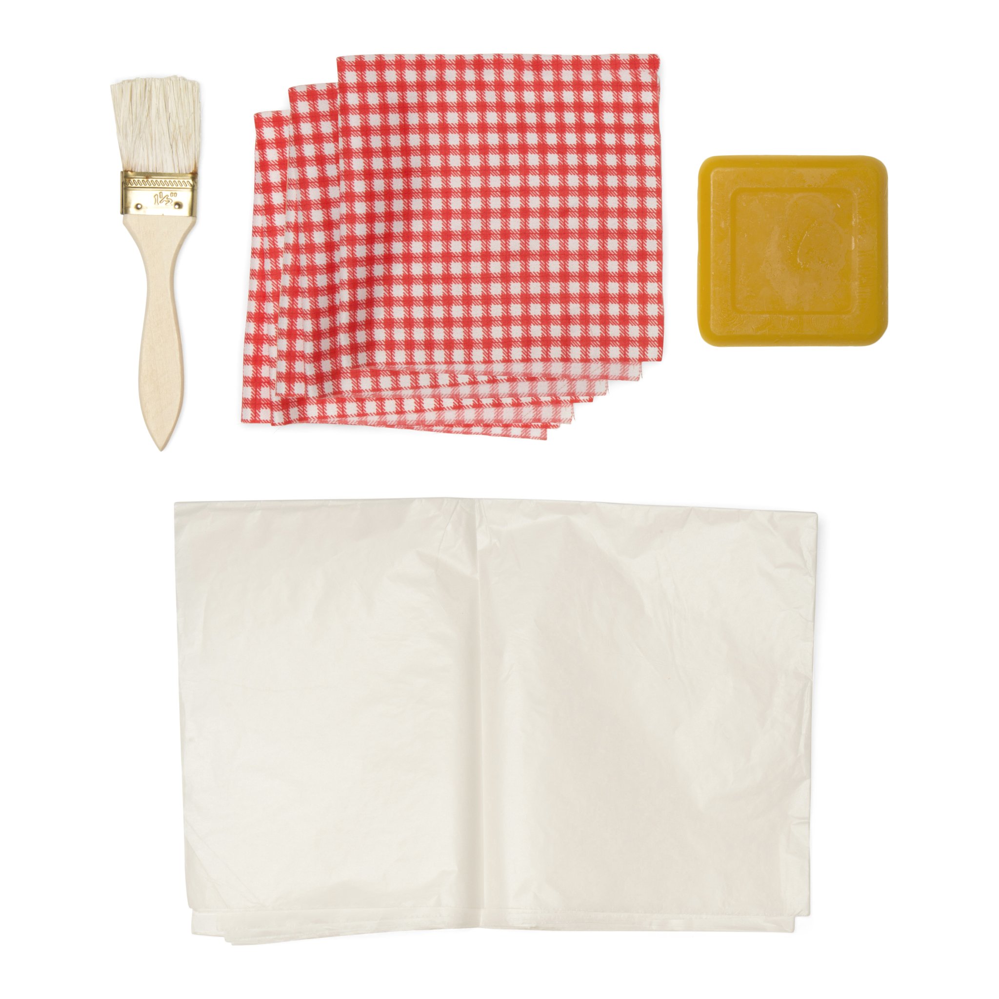 Contenu du kit : pinceau, trois tissus en coton à carreaux, bloc de cire d'abeille et papier cuisson