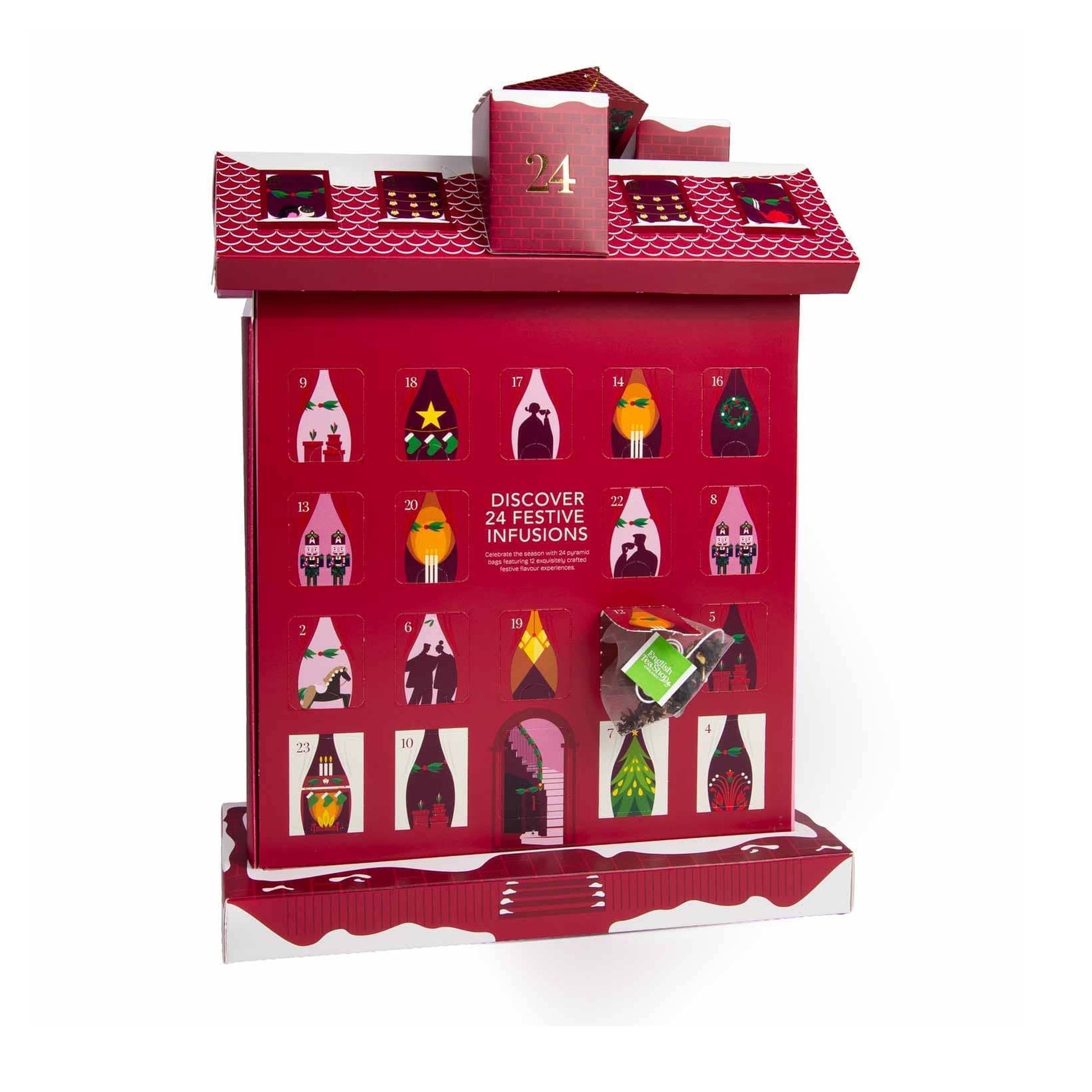 Intérieur du calendrier de l'Avent au thé avec 24 cases, un sachet pyramide dépassant d'une case ouverte