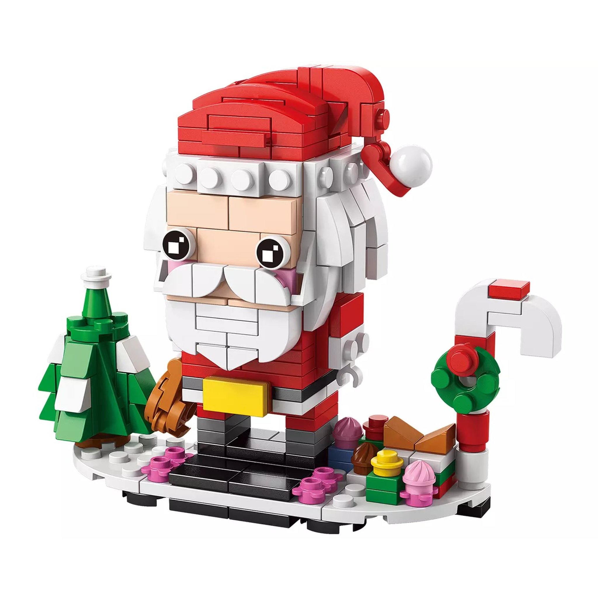 Father Christmas built from bricks with a tree and candy cane from the advent calendar