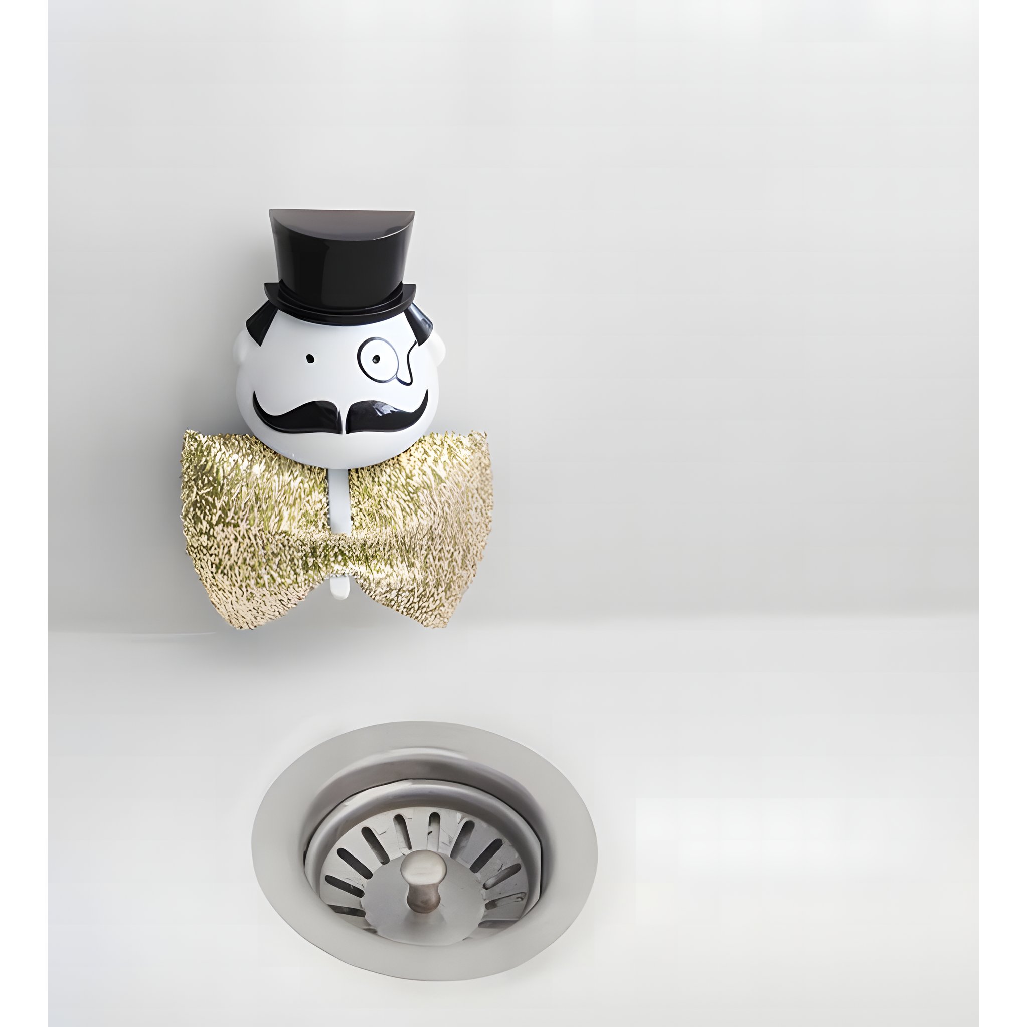 Mr. Sponge holder with gold glitter sponge at the sink