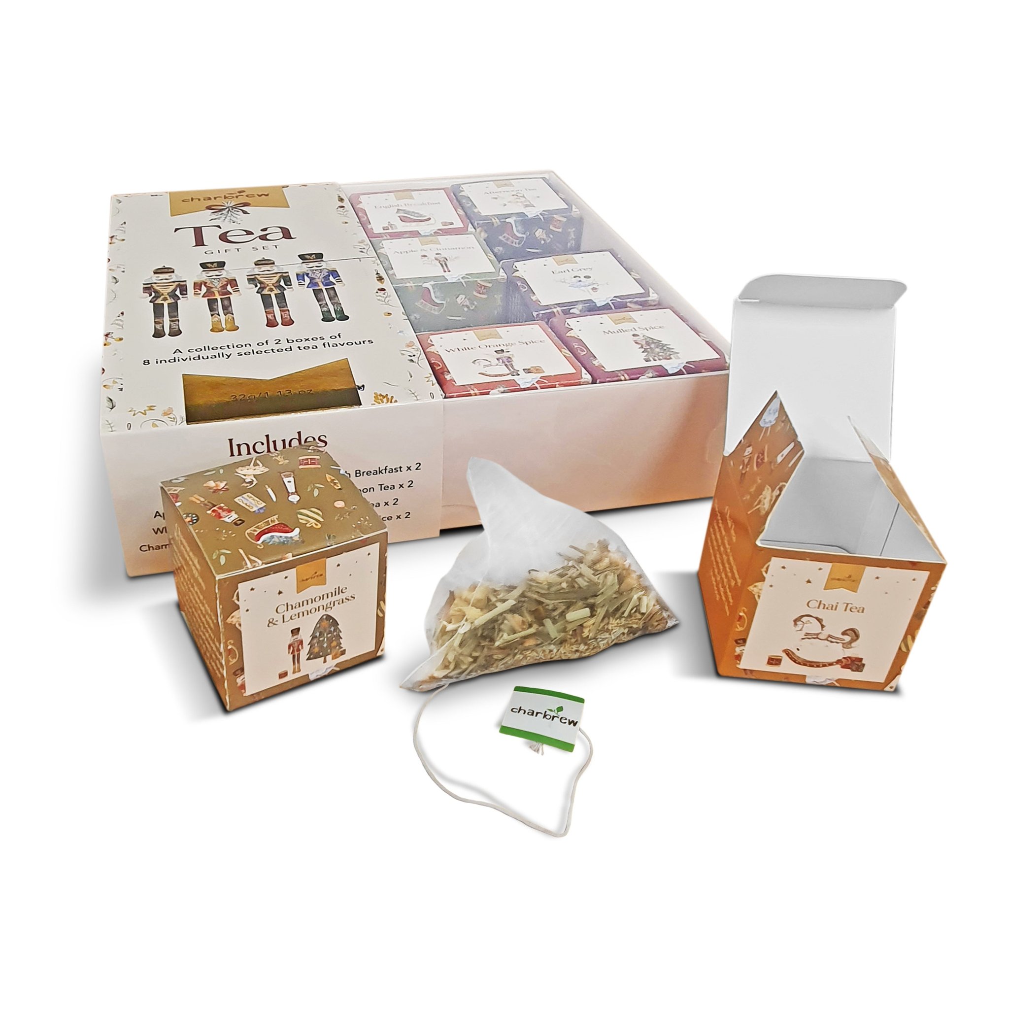 Opened Nutcracker tea box with a tea cube and pyramid tea bag in front
