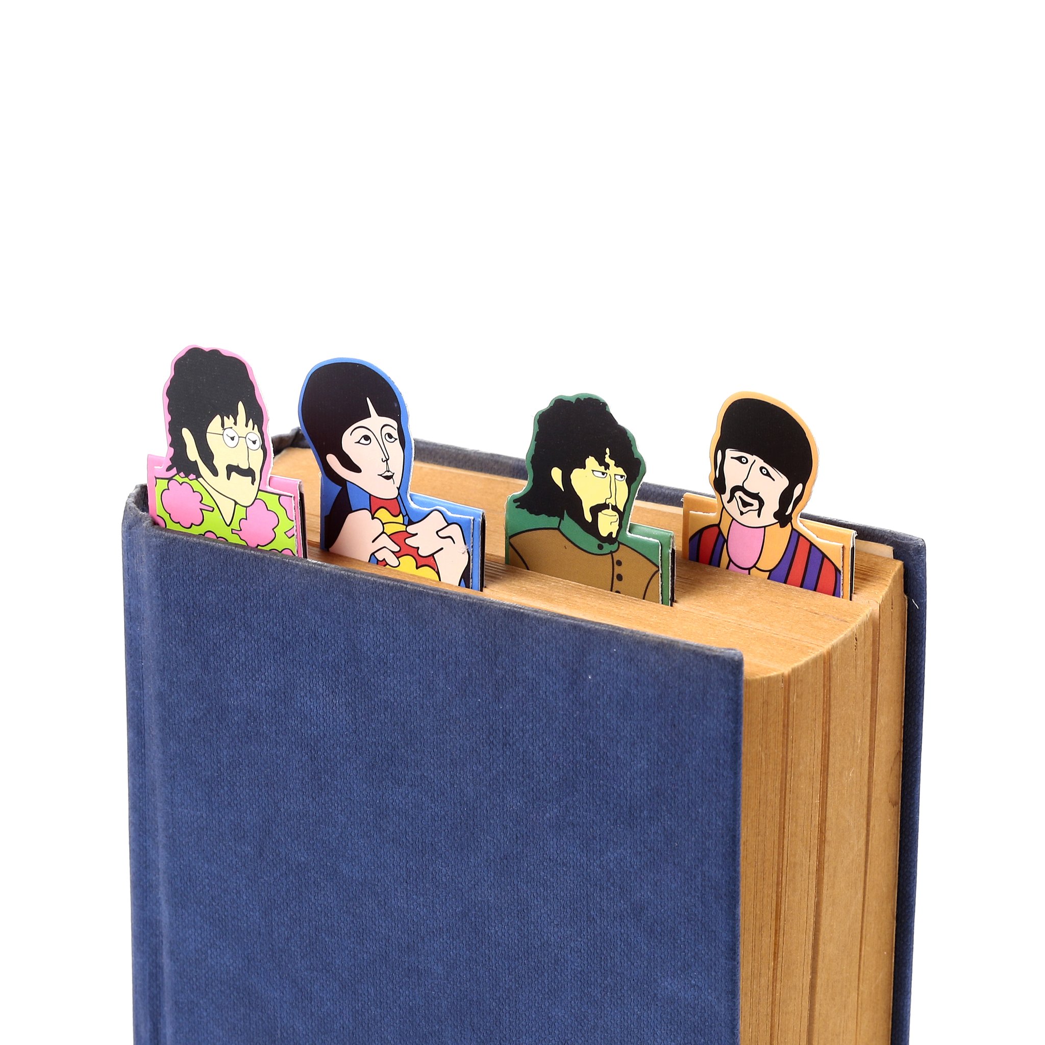 Beatles-Magnetlesezeichen am oberen Buchschnitt eingeklemmt