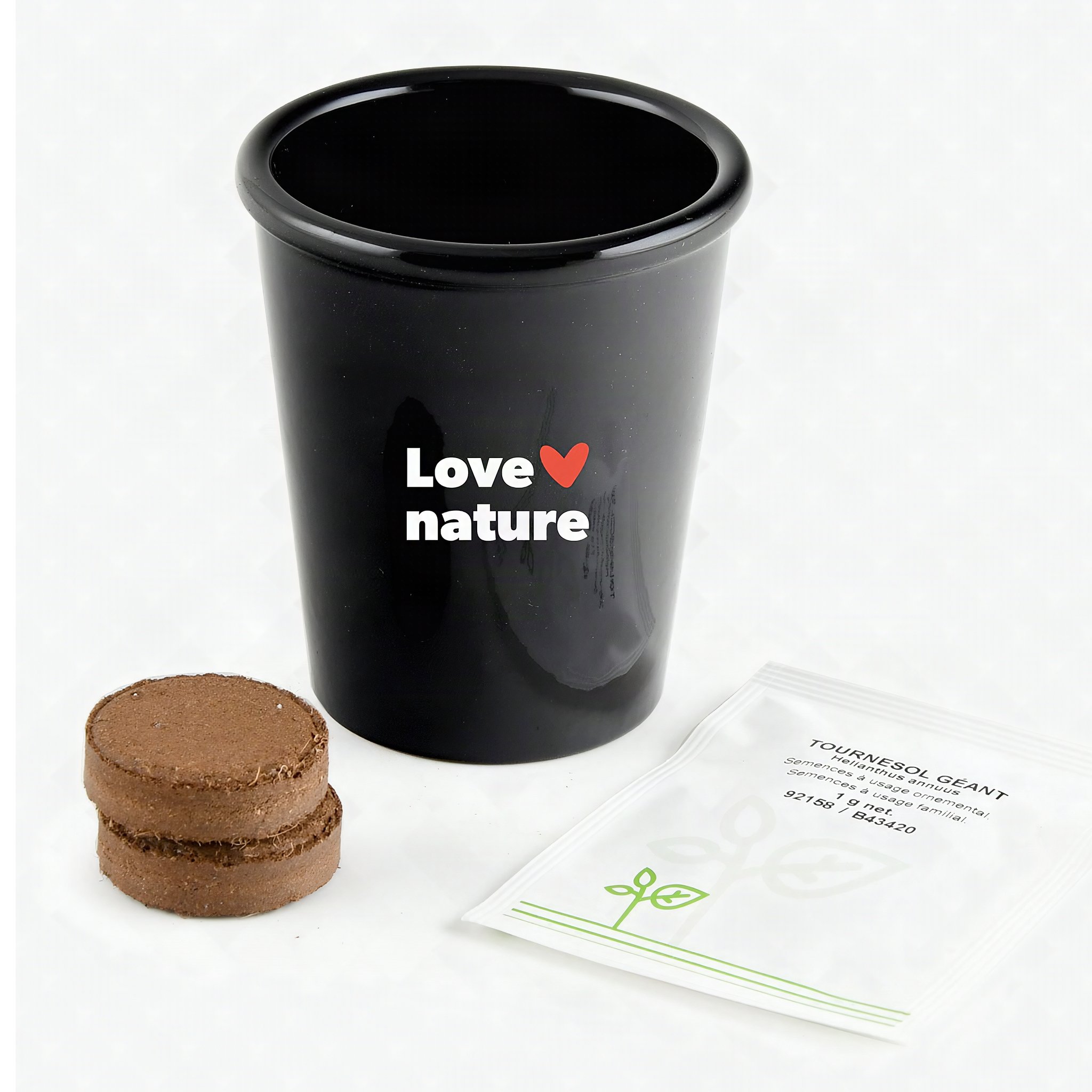 Contenuto: vaso nero per la coltivazione, bustina di semi di girasole e due pastiglie di cocco