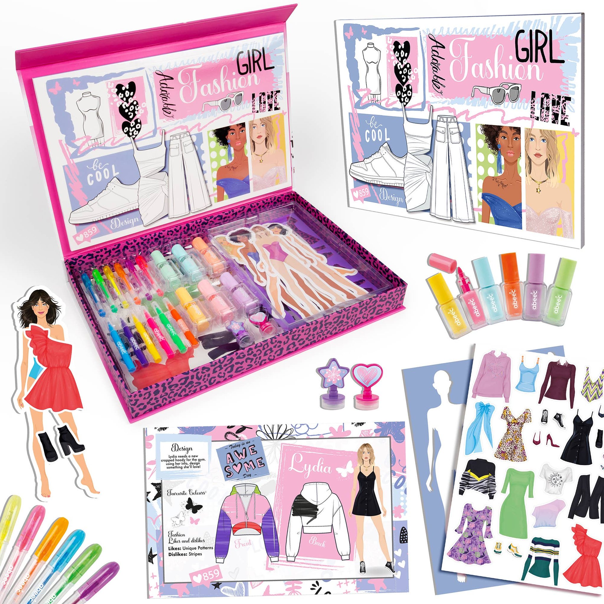 Geöffnete Designbox mit Stiften, Stempeln und Anziehpuppen aus dem Modedesigner-Set