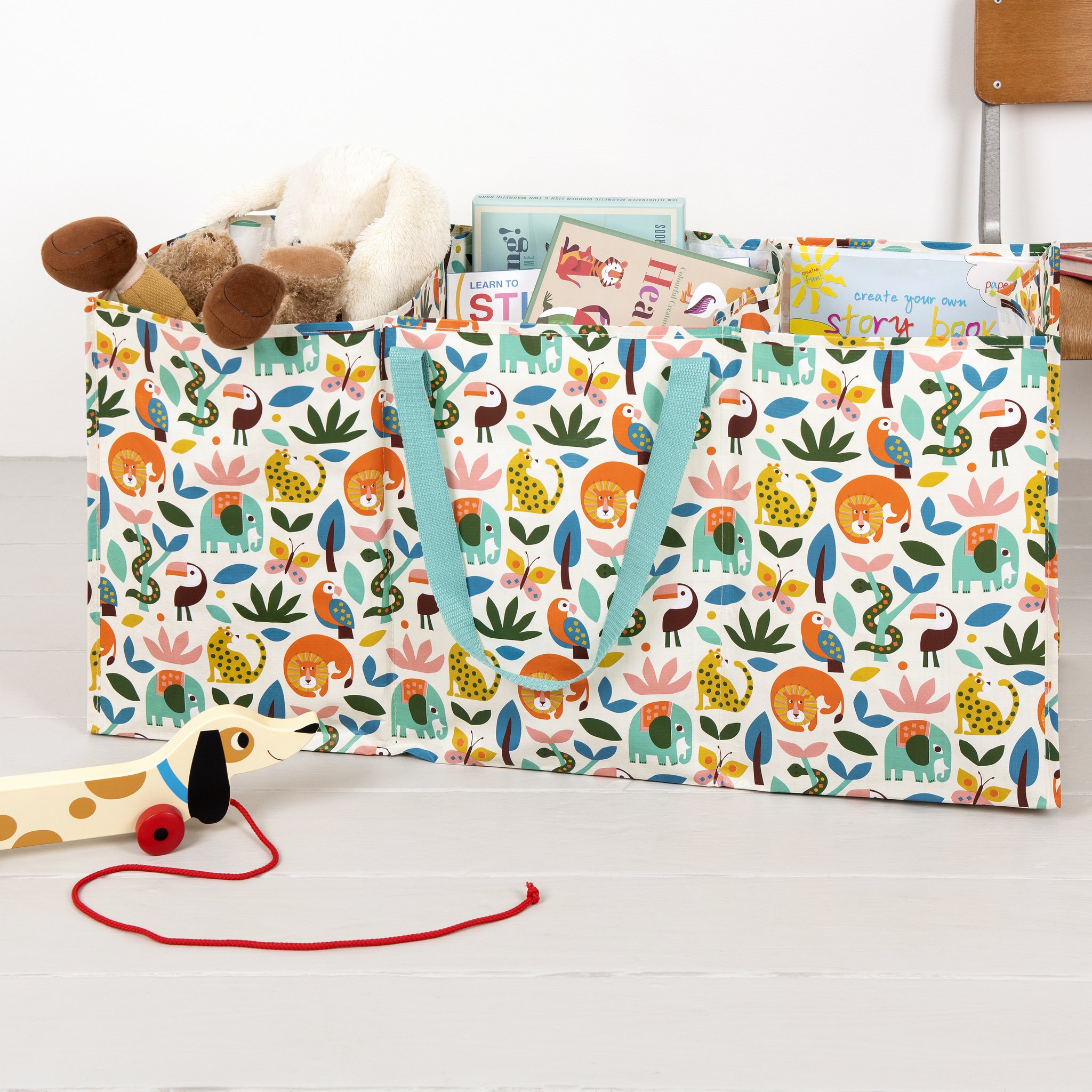 Wild Wonders Aufbewahrungstasche voller Spielsachen und Bücher im Kinderzimmer