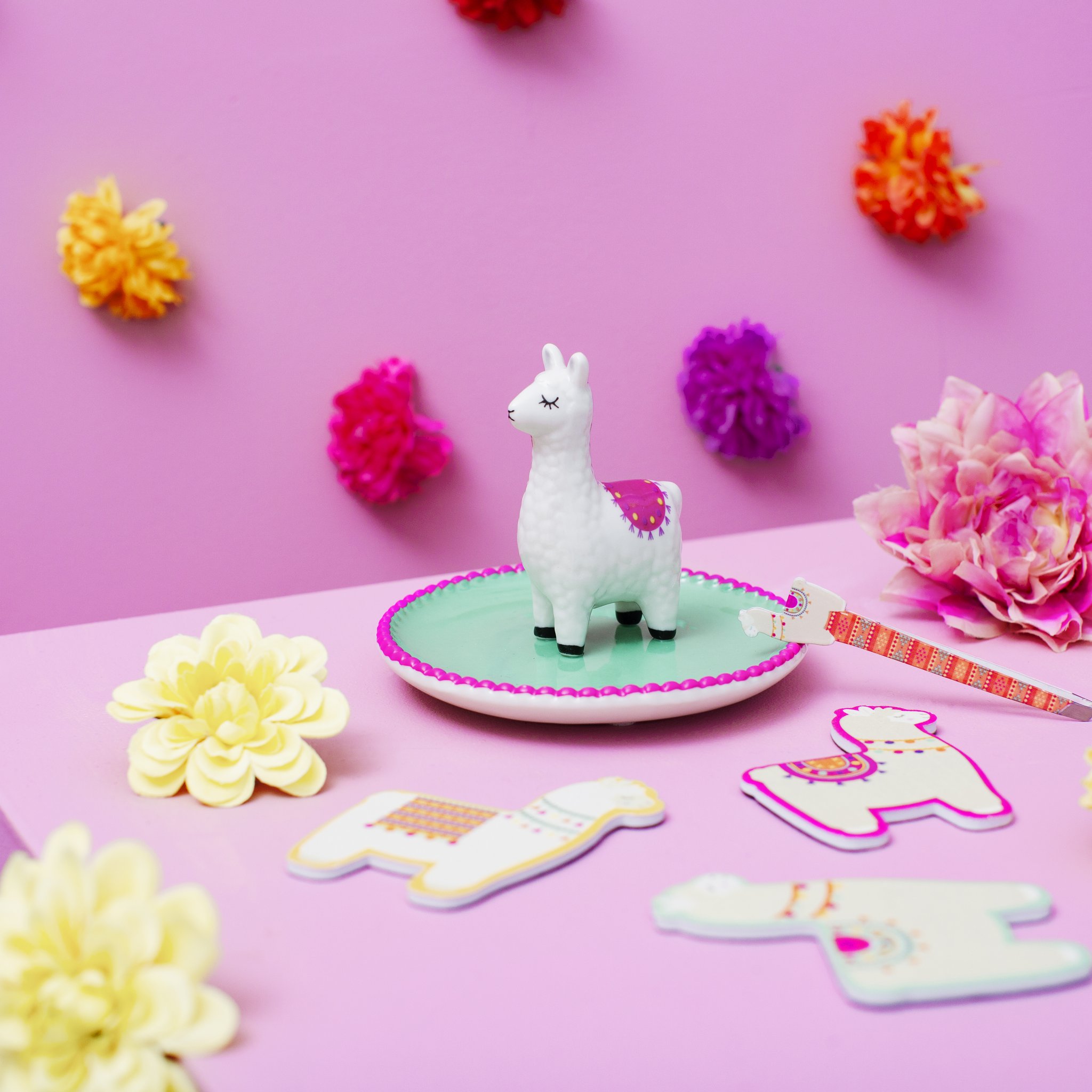 Lima llama trinket dish by Sass & Belle on pink with flowers and llama cards