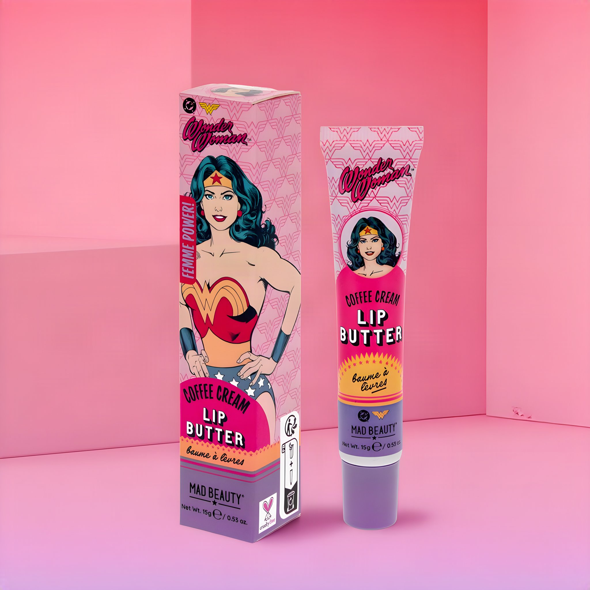 Wonder Woman Coffee Cream lip butter: tube next to the carton with comic Wonder Woman in a pink room