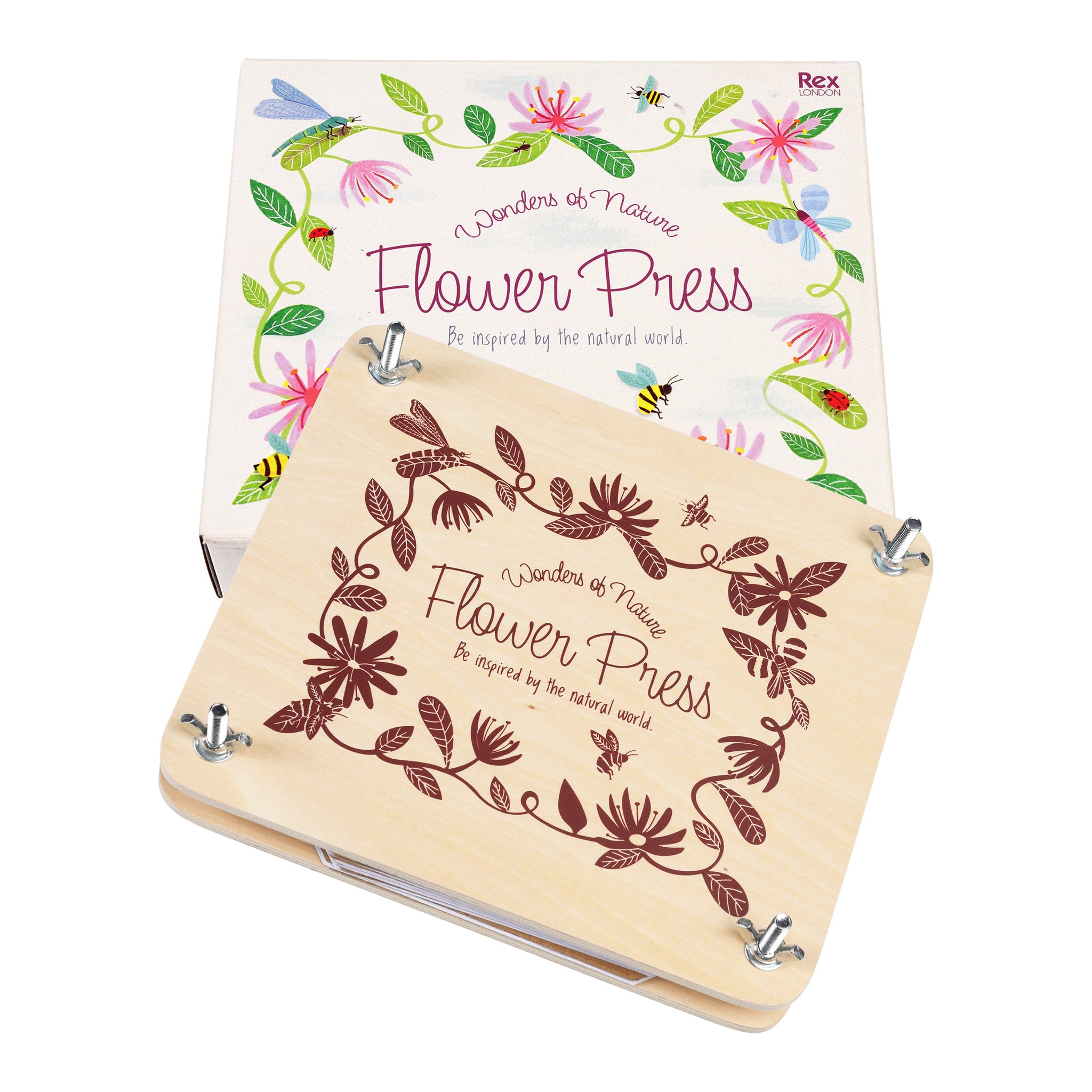 Presse-fleurs « Wonders of Nature » : presse en bois à motif floral devant la boîte colorée