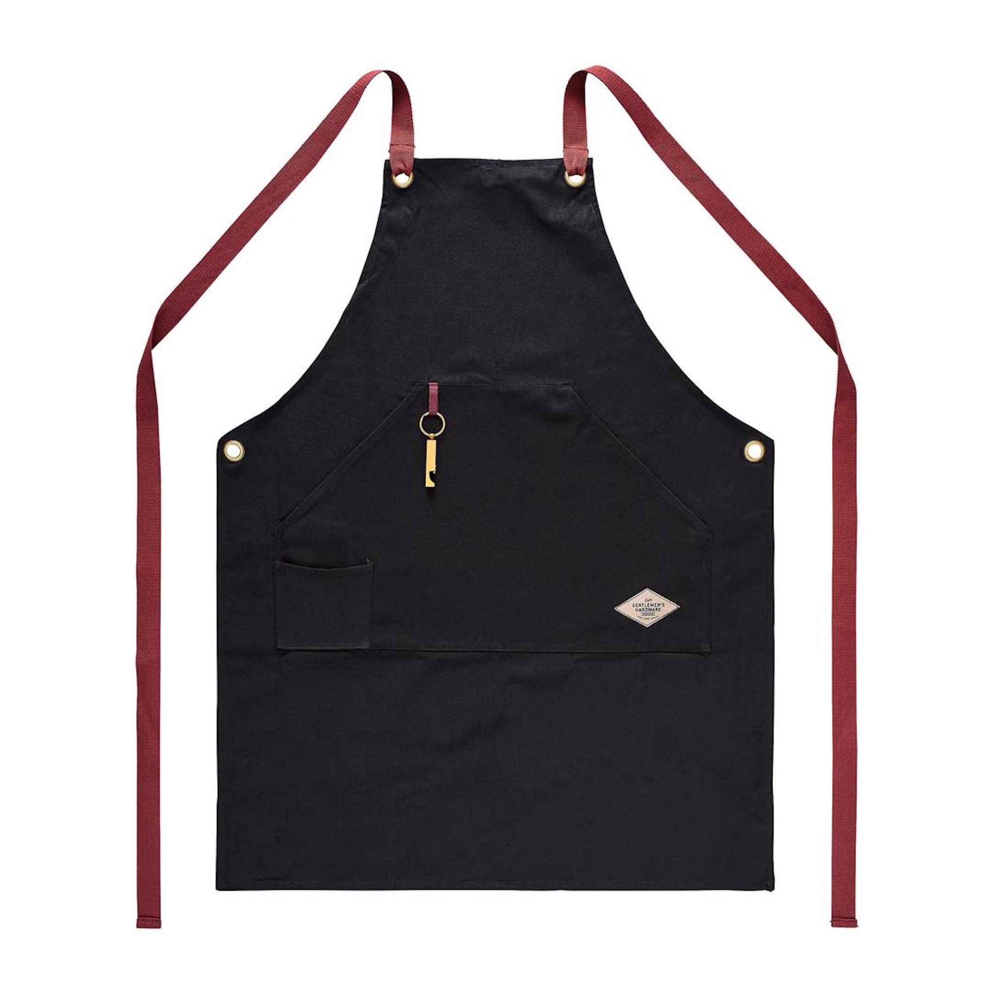 Front view of the black BBQ apron with red straps, metal eyelets, a front pocket and a bottle opener on a loop