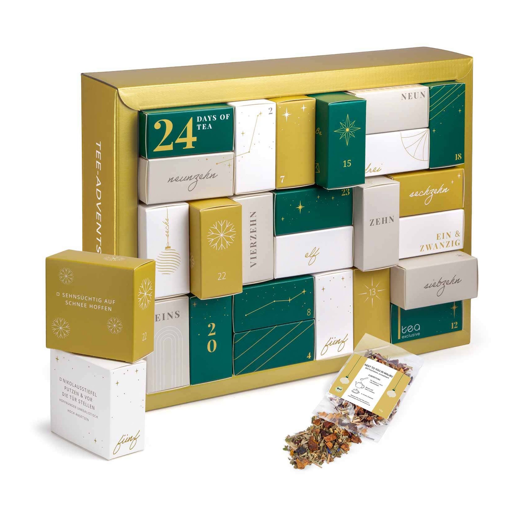 Erlebnis Tee-Adventskalender 2026 in Gold und Grün mit herausgezogenen Schachteln und losem Tee