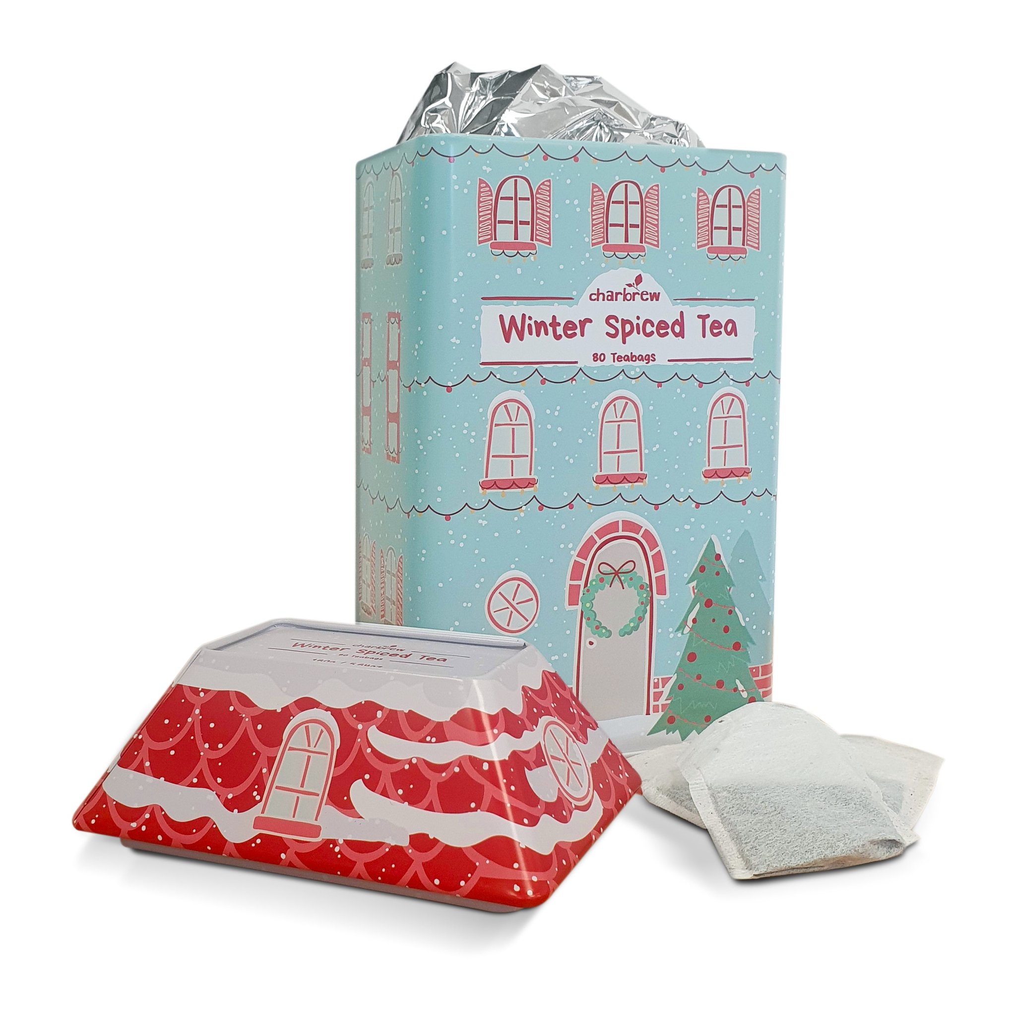Opened house-shaped tea tin with the roof lid removed and tea bags