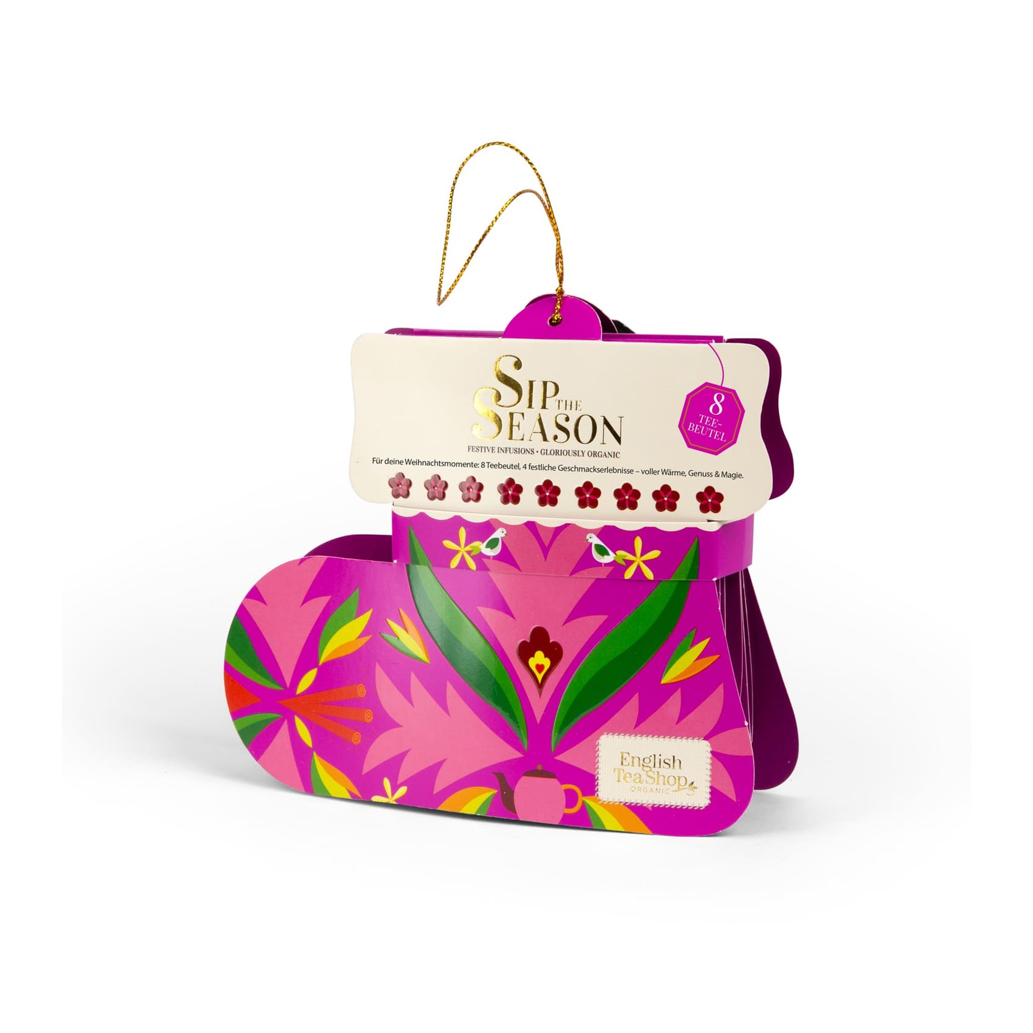 Botte de Noël rose garnie de thé vue de côté, avec son bandeau crème en haut