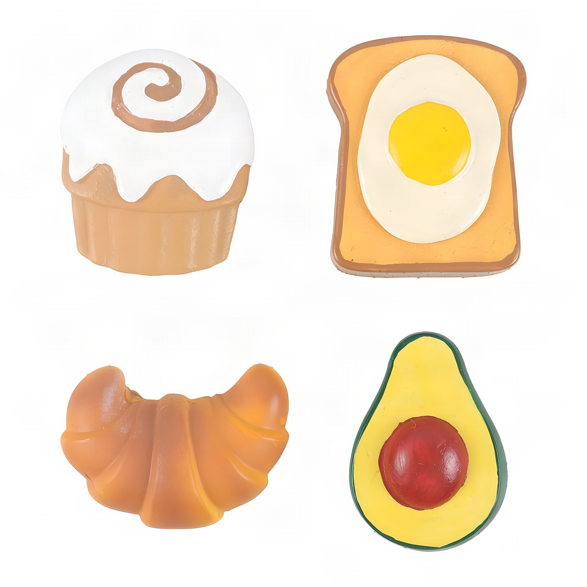 I quattro magneti Brunch Club fuori dalla confezione: girella, toast con uovo, cornetto e avocado