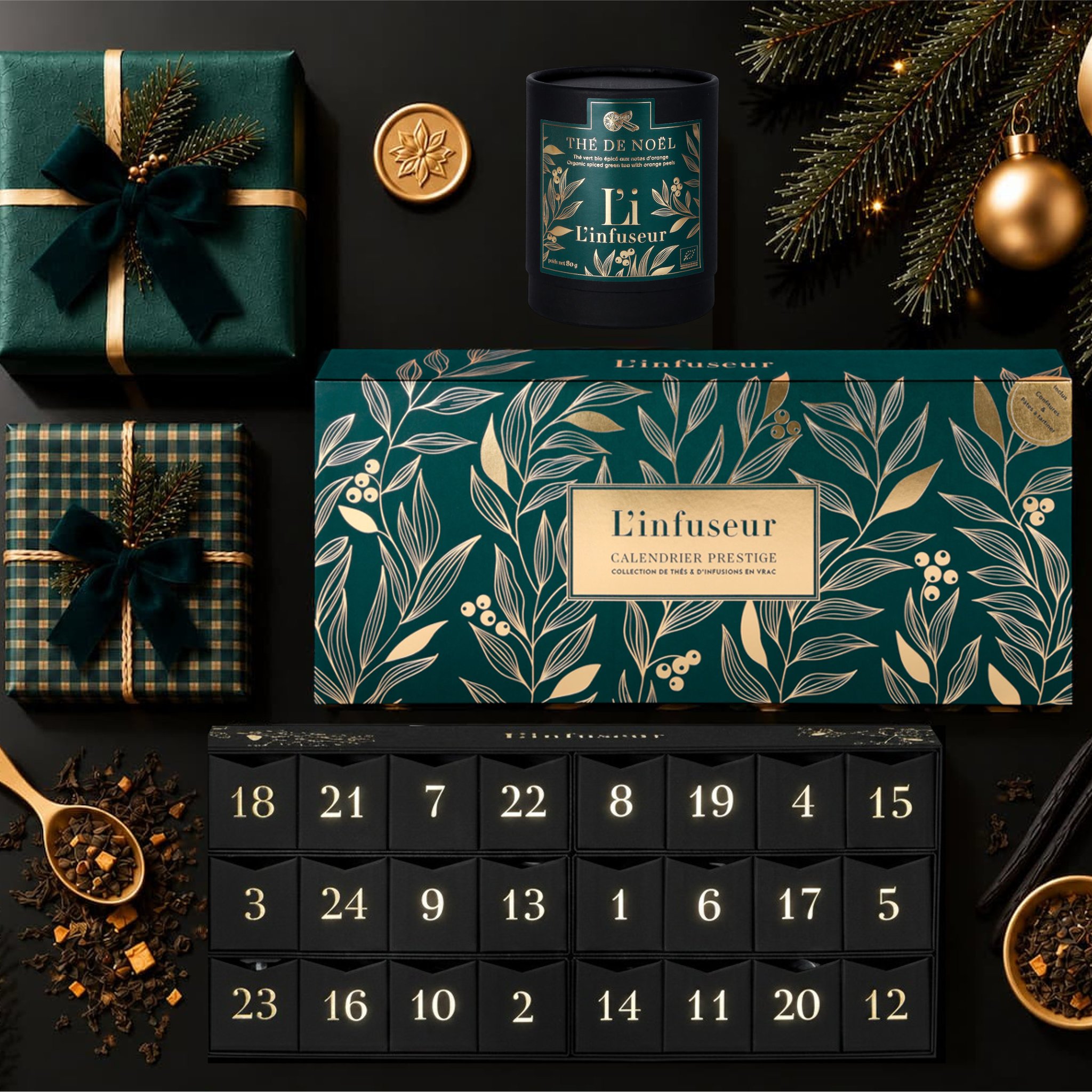 L'infuseur Tee-Adventskalender Prestige: tannengrüner Schuber mit Goldprägung und schwarzer Korpus mit 24 nummerierten Schubladen, weihnachtlich dekoriert