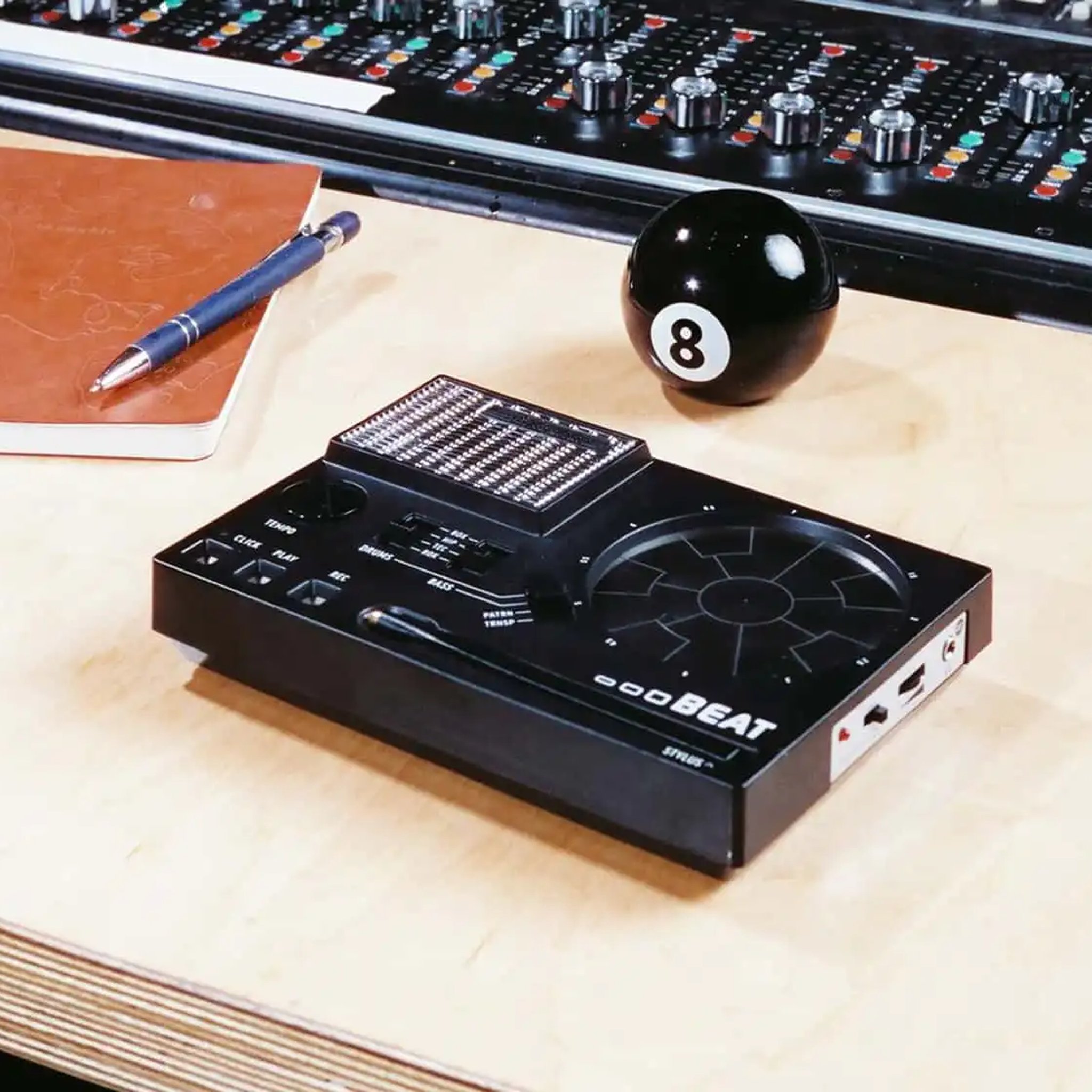 Stylophone BEAT on a desk next to studio gear