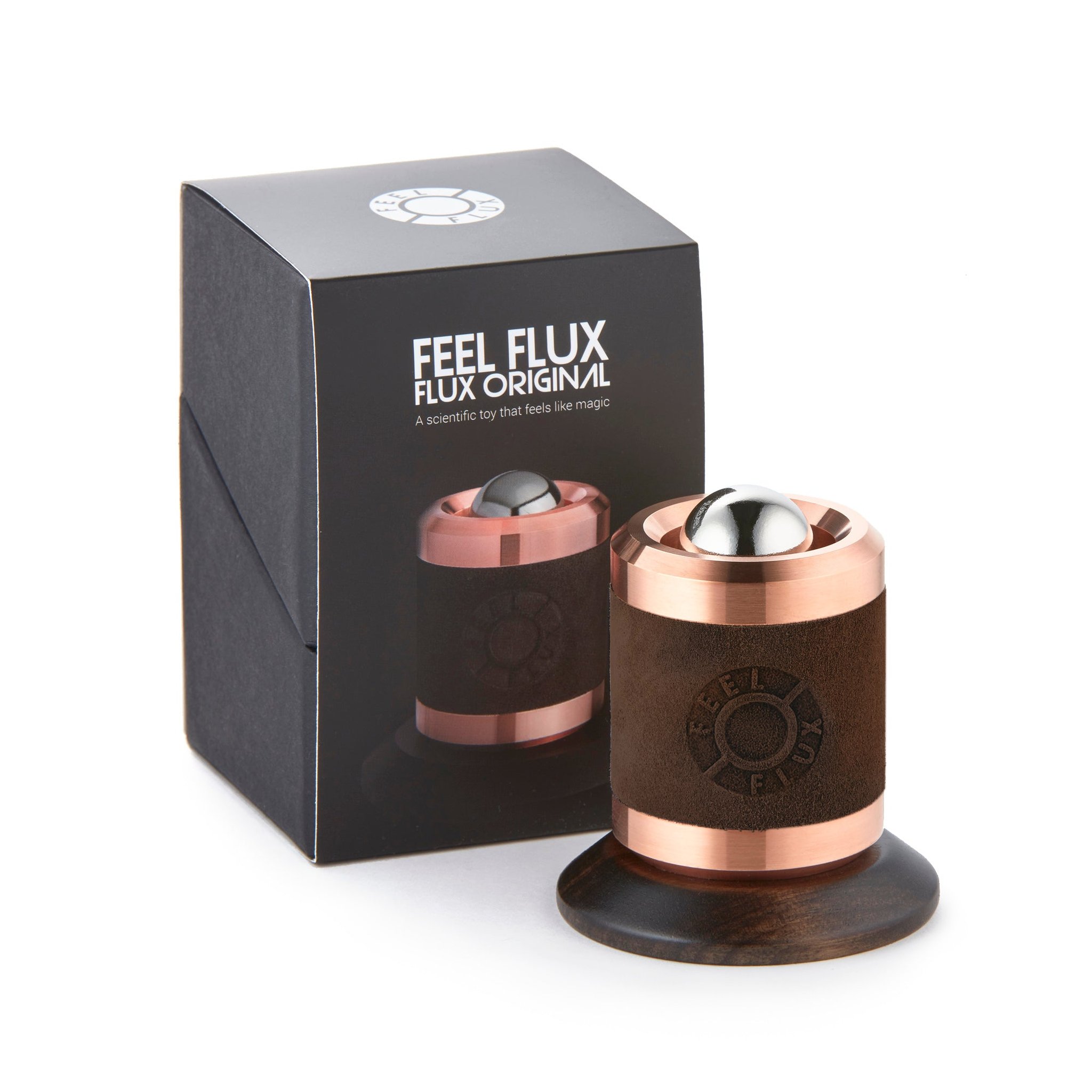 Feel Flux Original in Braun neben der schwarzen Geschenkbox