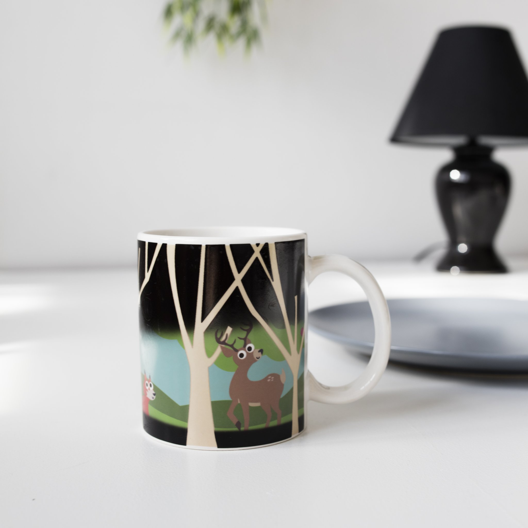 Woodlands Heat Change Mug – forest motif detail with deer