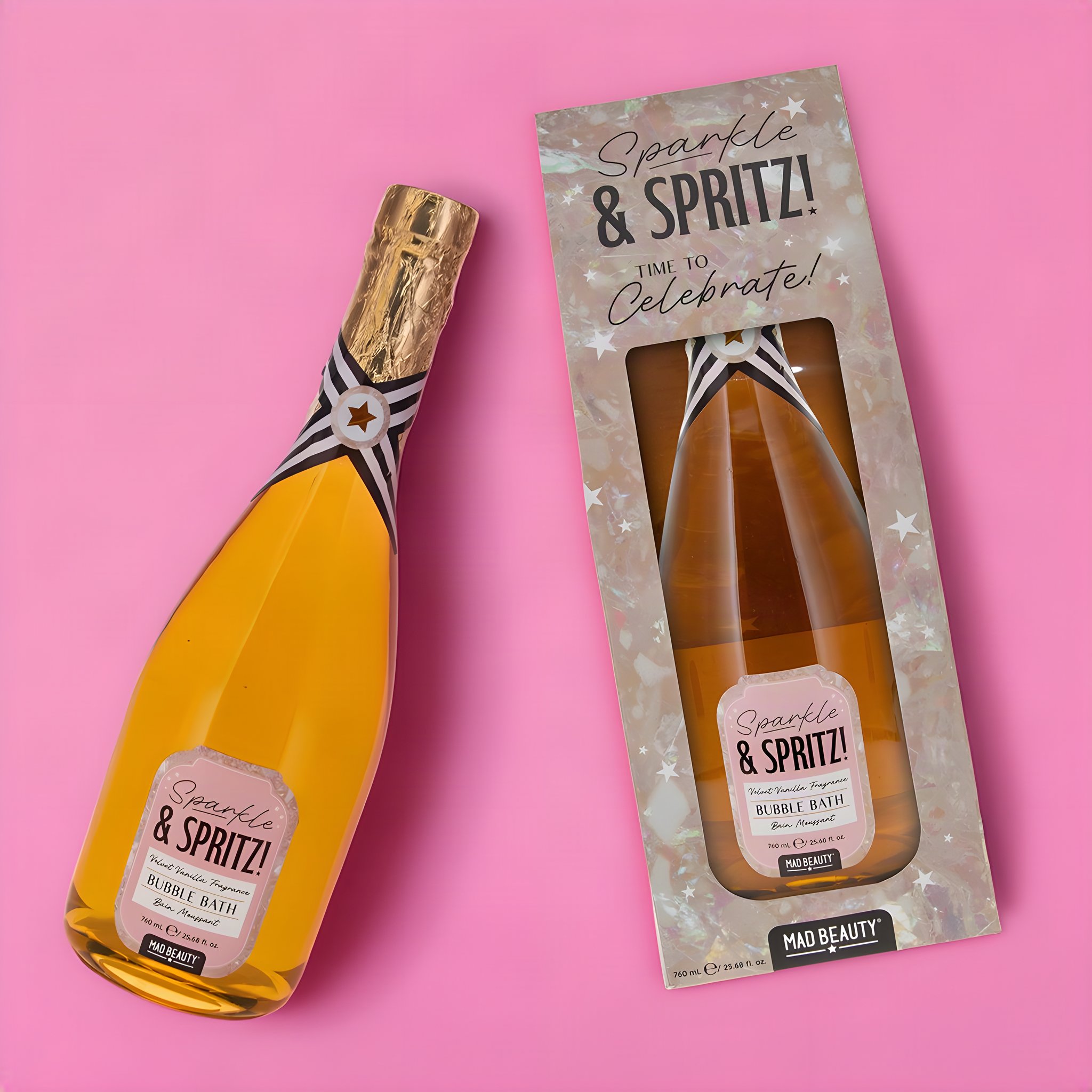 Sparkle & Spritz Schaumbad Vanille in der Sektflasche neben der Verpackung «Time to celebrate», Rosa