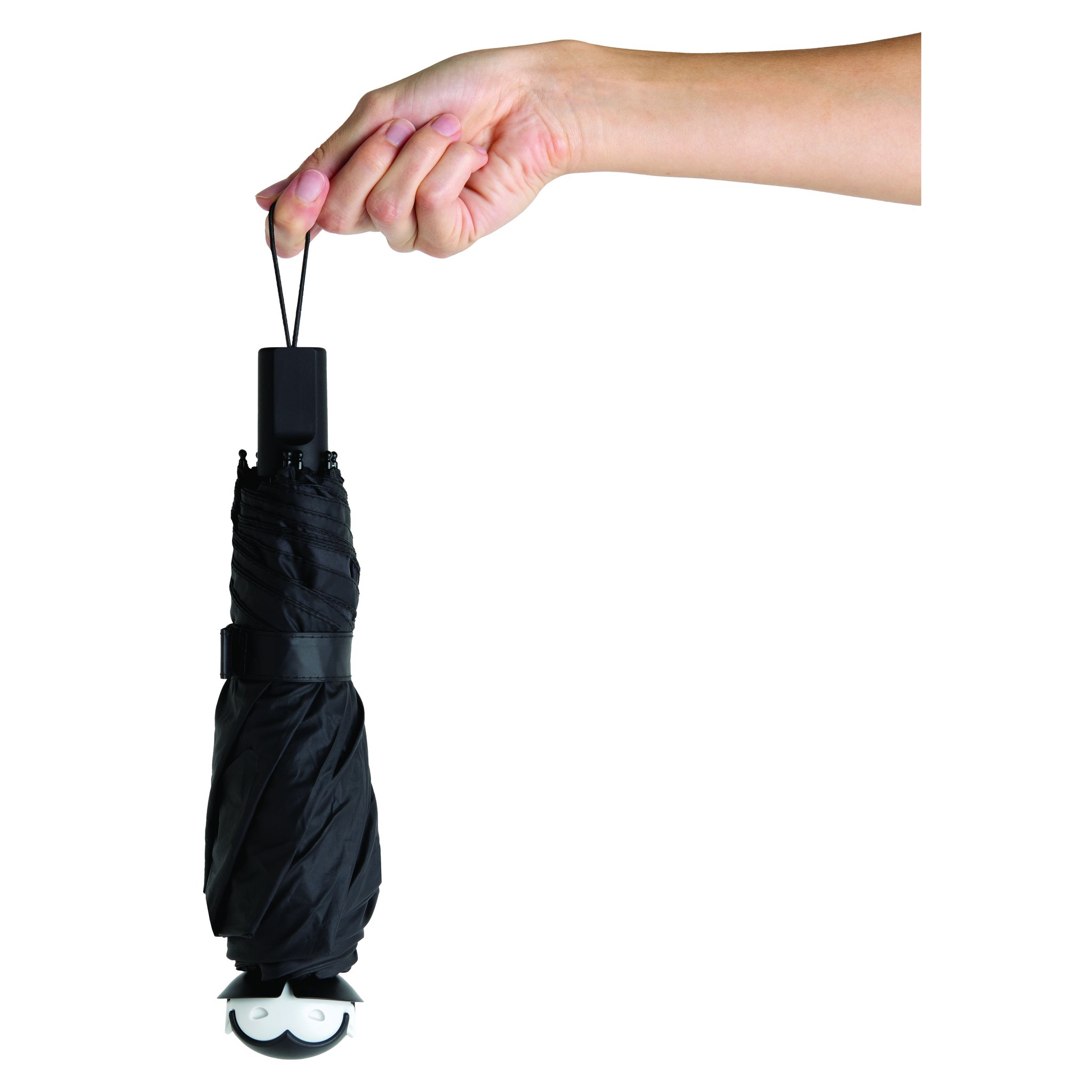 Hand holding the folded Spookula umbrella
