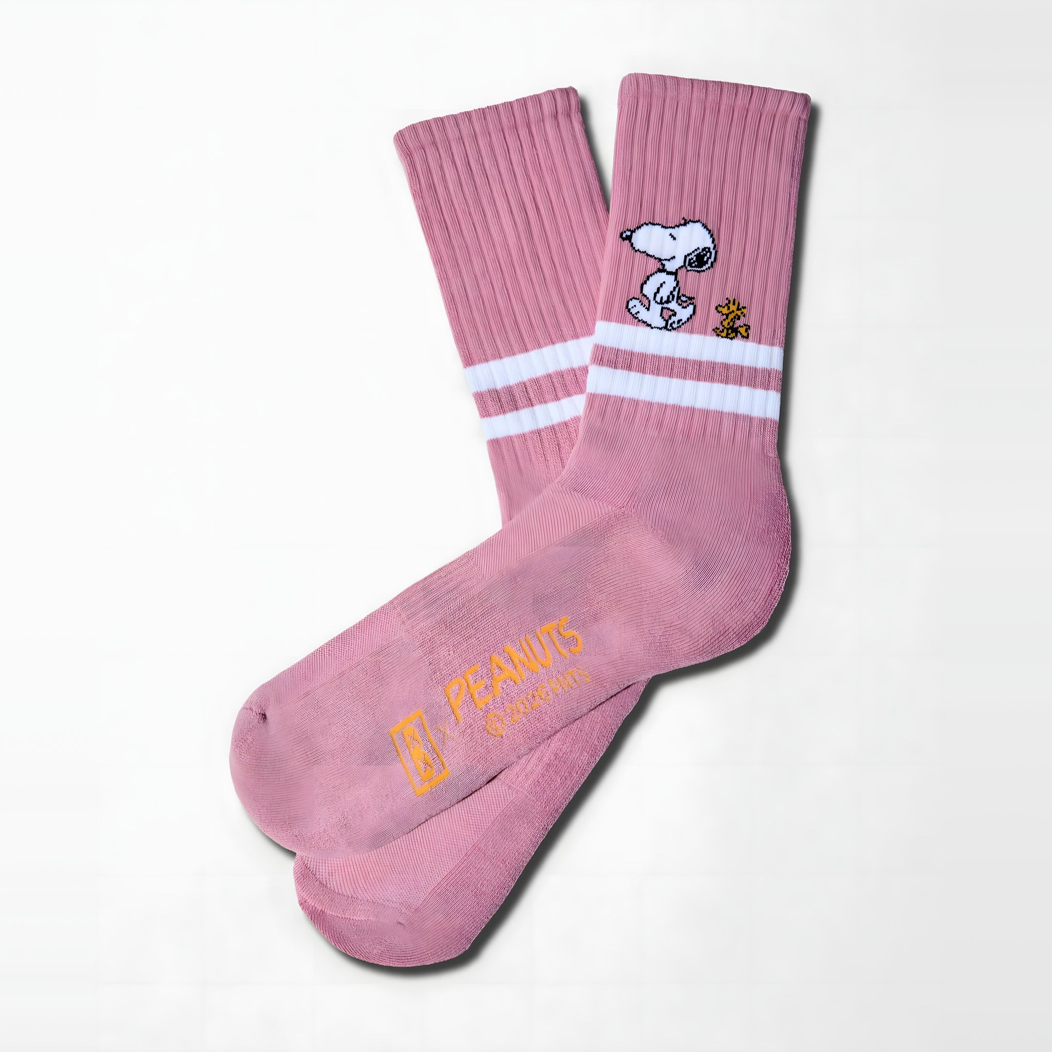 Snoopy tennis socks pink: one pair with white stripes, Snoopy and Woodstock at the cuff, PEANUTS on the sole