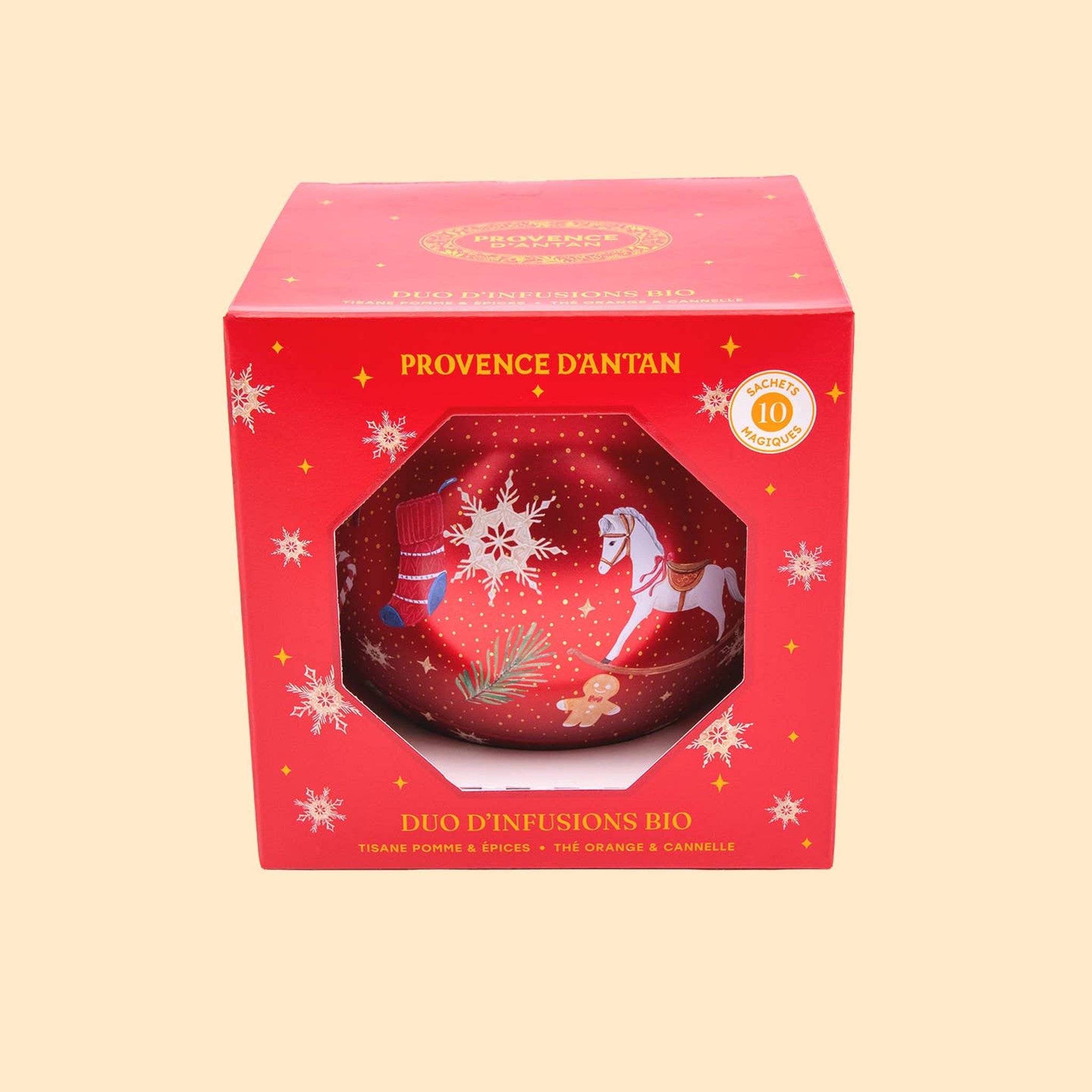 Roter Geschenkkarton Duo d'infusions bio mit Weihnachtskugel hinter dem Sichtfenster