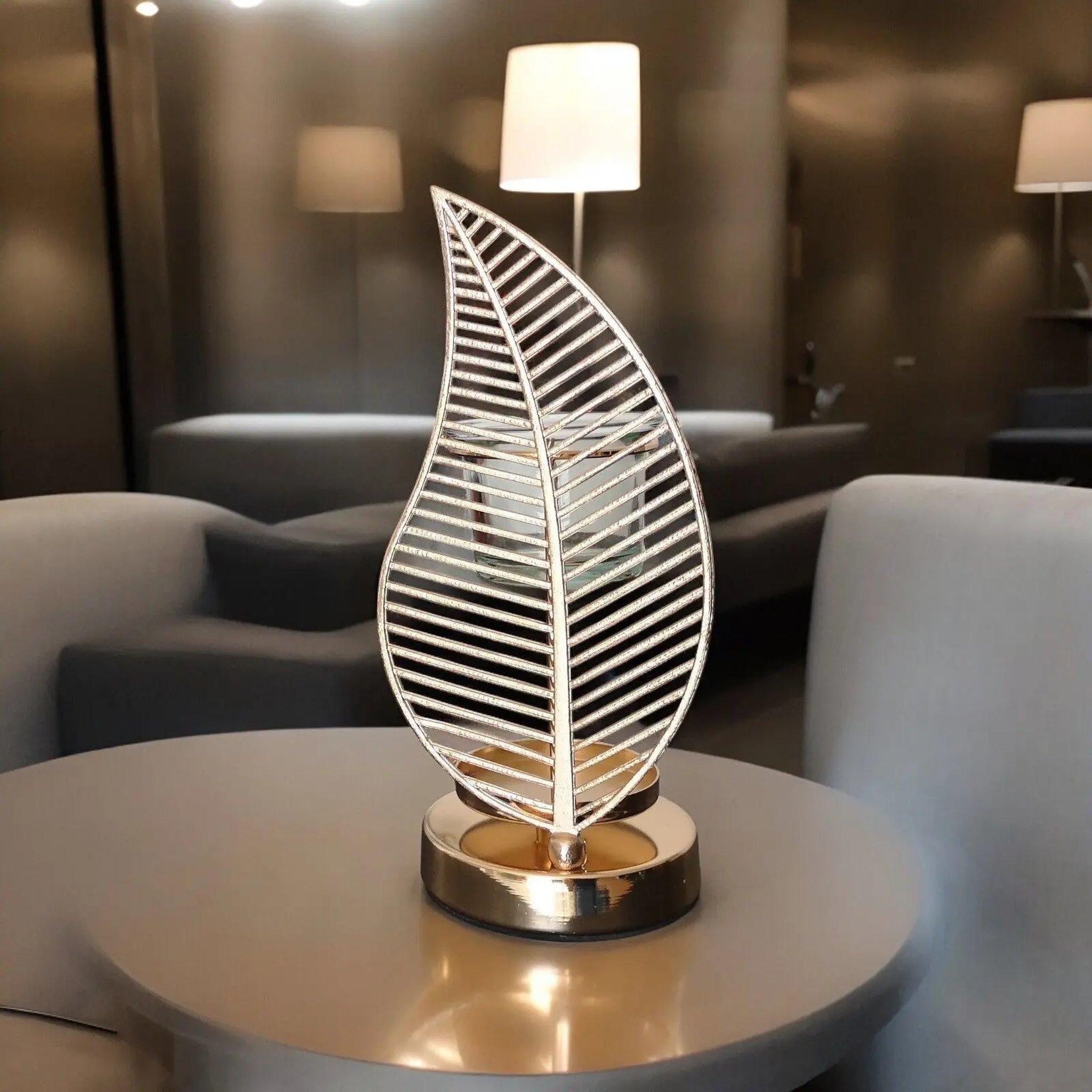 Palm leaf oil burner on a round side table in a lounge