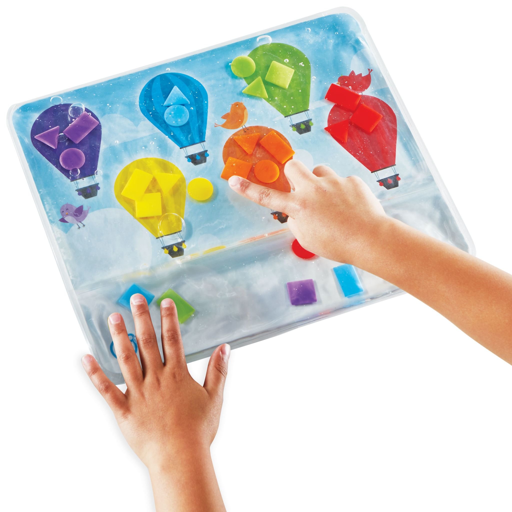 Farben & Formen Sensorik-Pad – Kinderhände schieben Formen im Pad