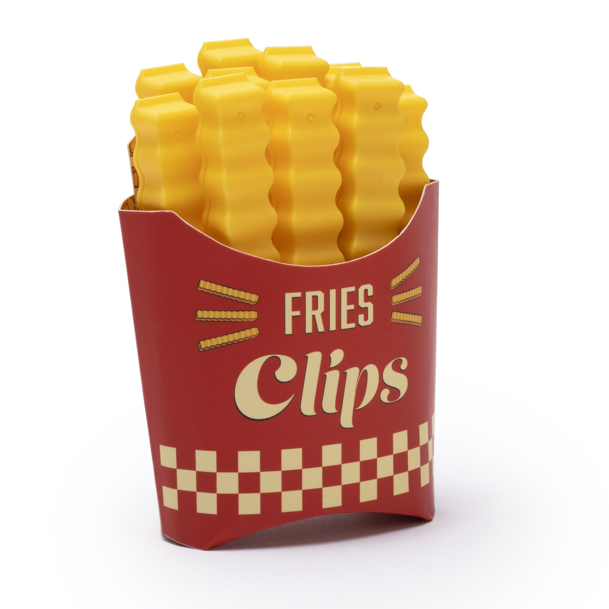 Pommes Magnet-Box mit gelben Tütenklammern frontal vor weissem Hintergrund