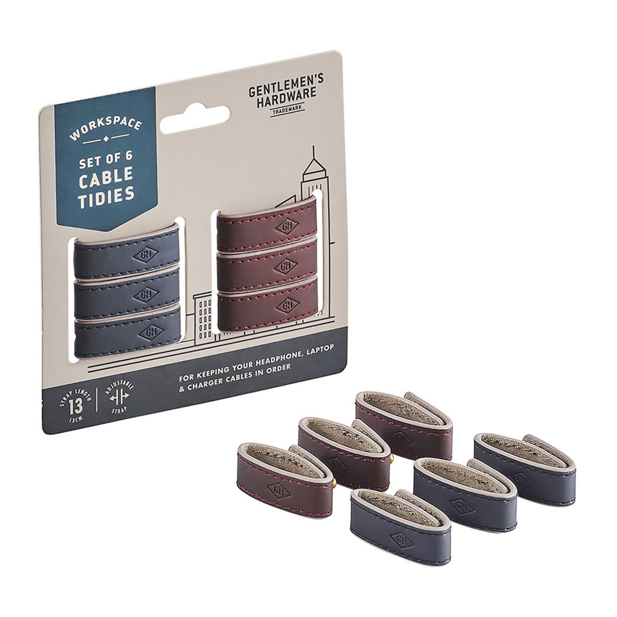 Set Cable Tidies dans son emballage, avec six attaches fermées en boucle posées devant
