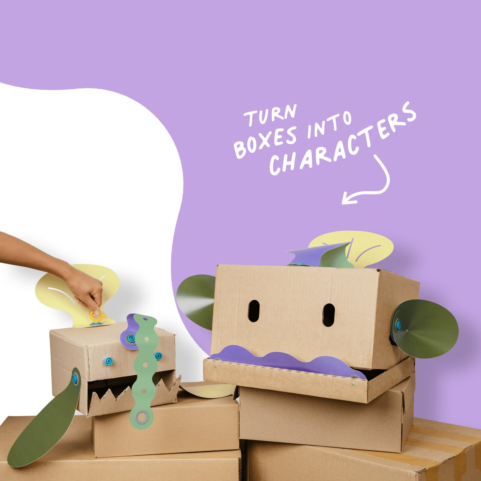 Monstre en carton avec des Blobbies comme dents, cheveux et oreilles