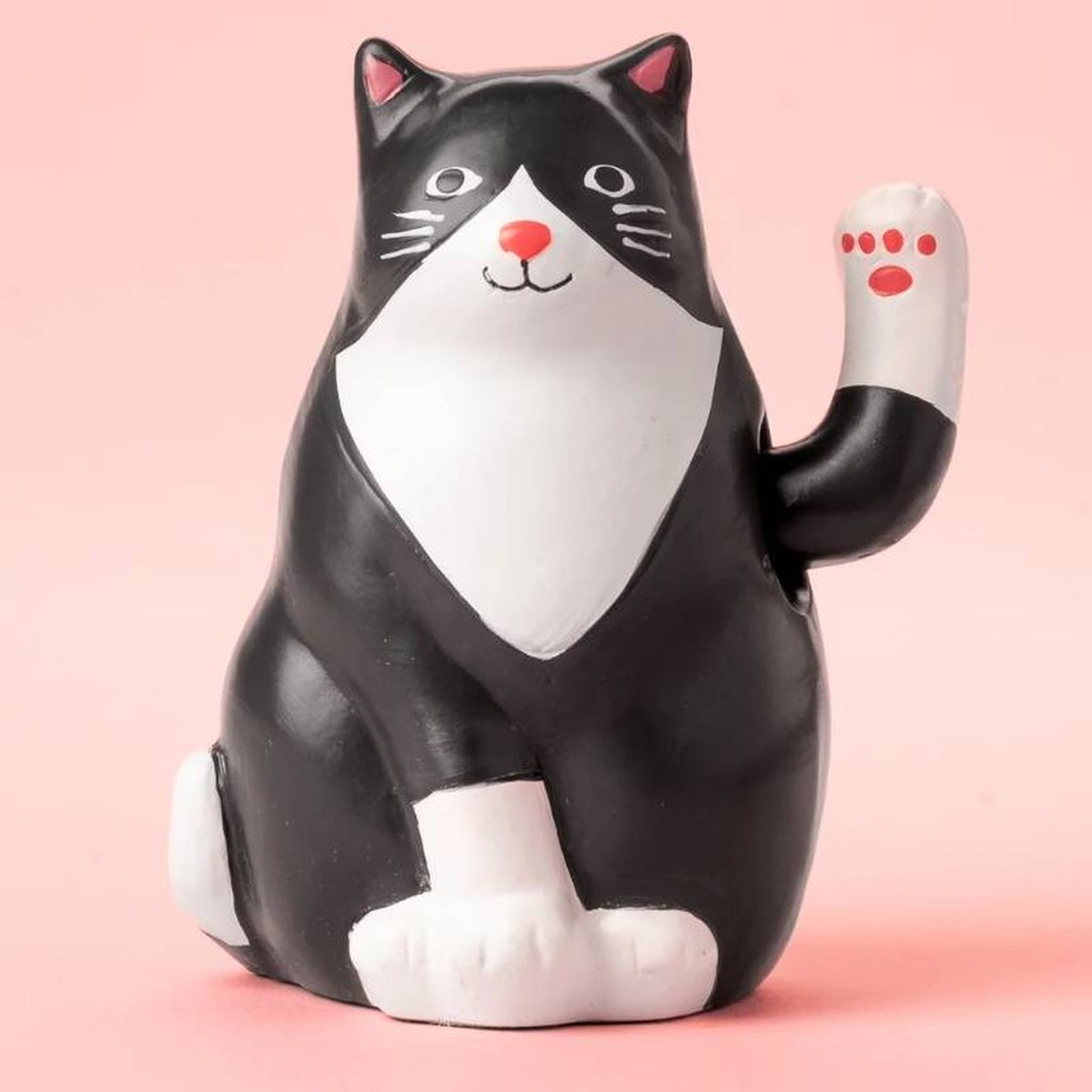 Solar cat against a pink background