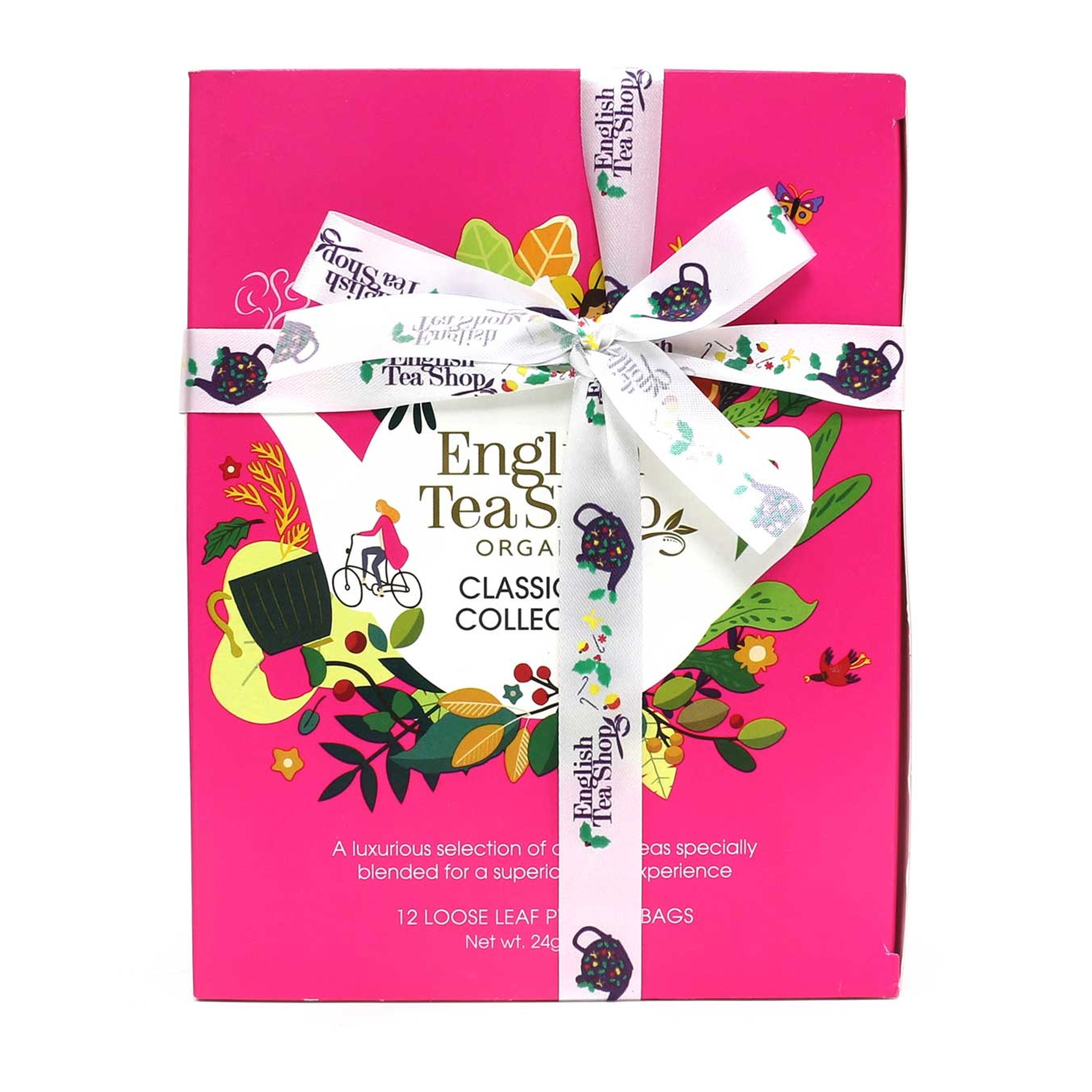 Set regalo di tè classici in scatola rosa legata con un nastro, vista frontale