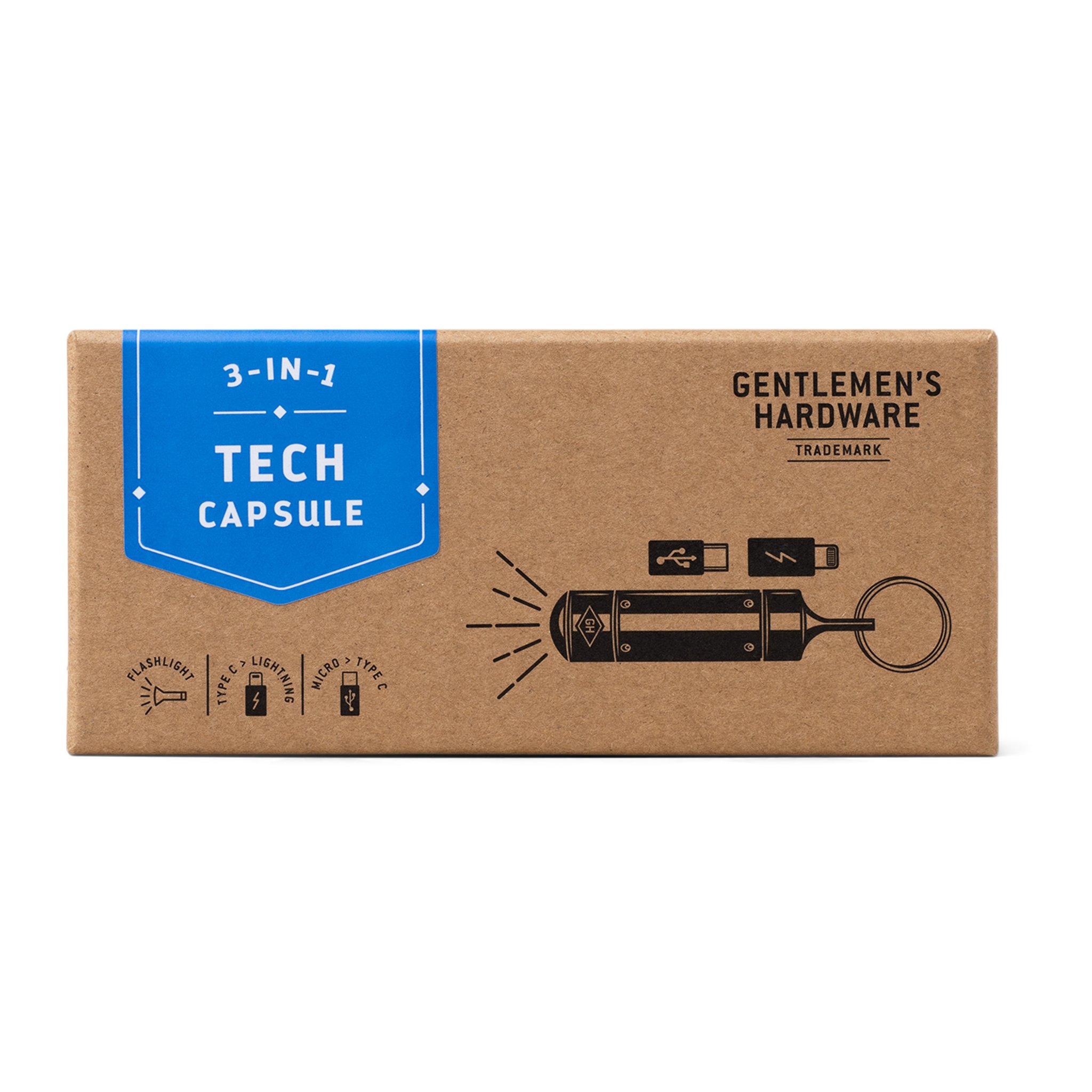 Brown cardboard box of the Tech Capsule Keychain with a blue label and a drawing of the capsule