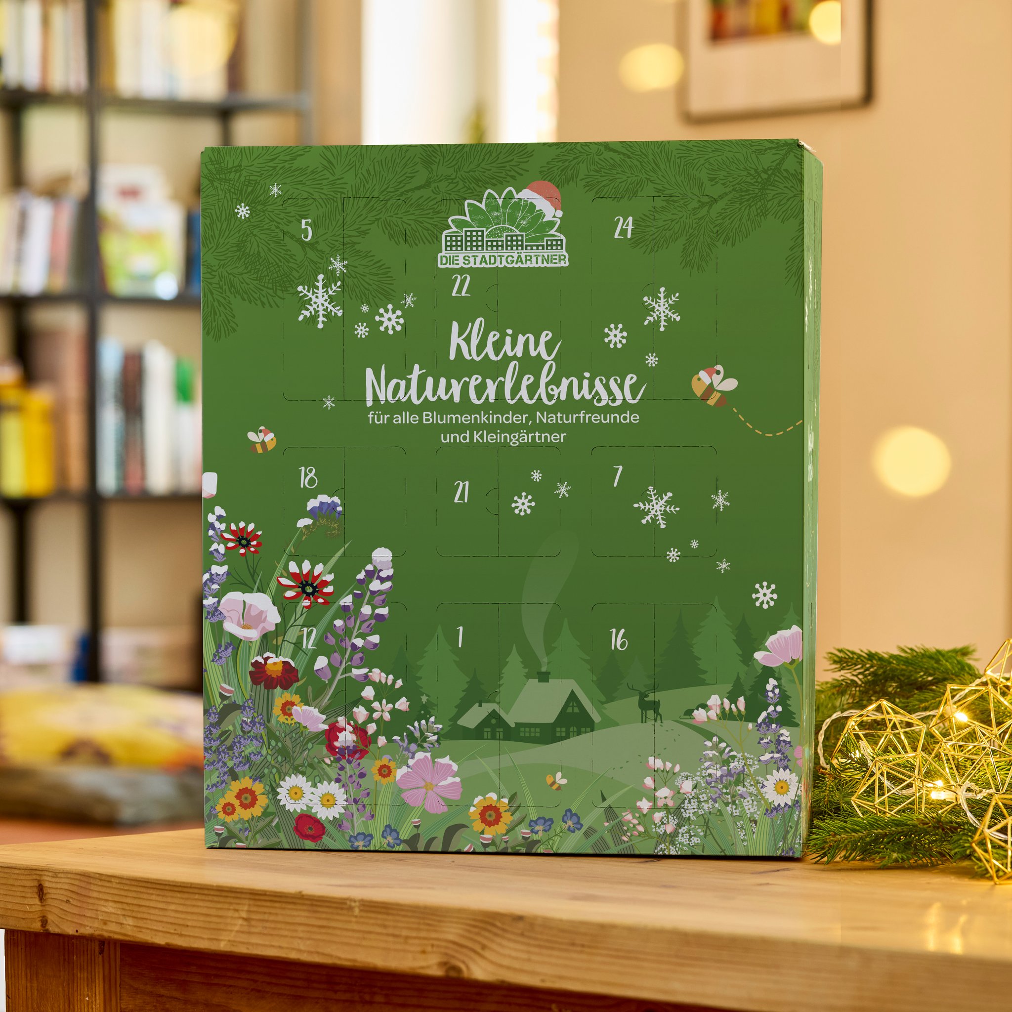 Grande calendario dell'Avvento giardino Naturerlebnisse su un tavolo di legno in un soggiorno accogliente