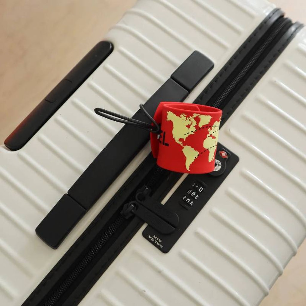 Slap on Kofferanhänger von Kikkerland