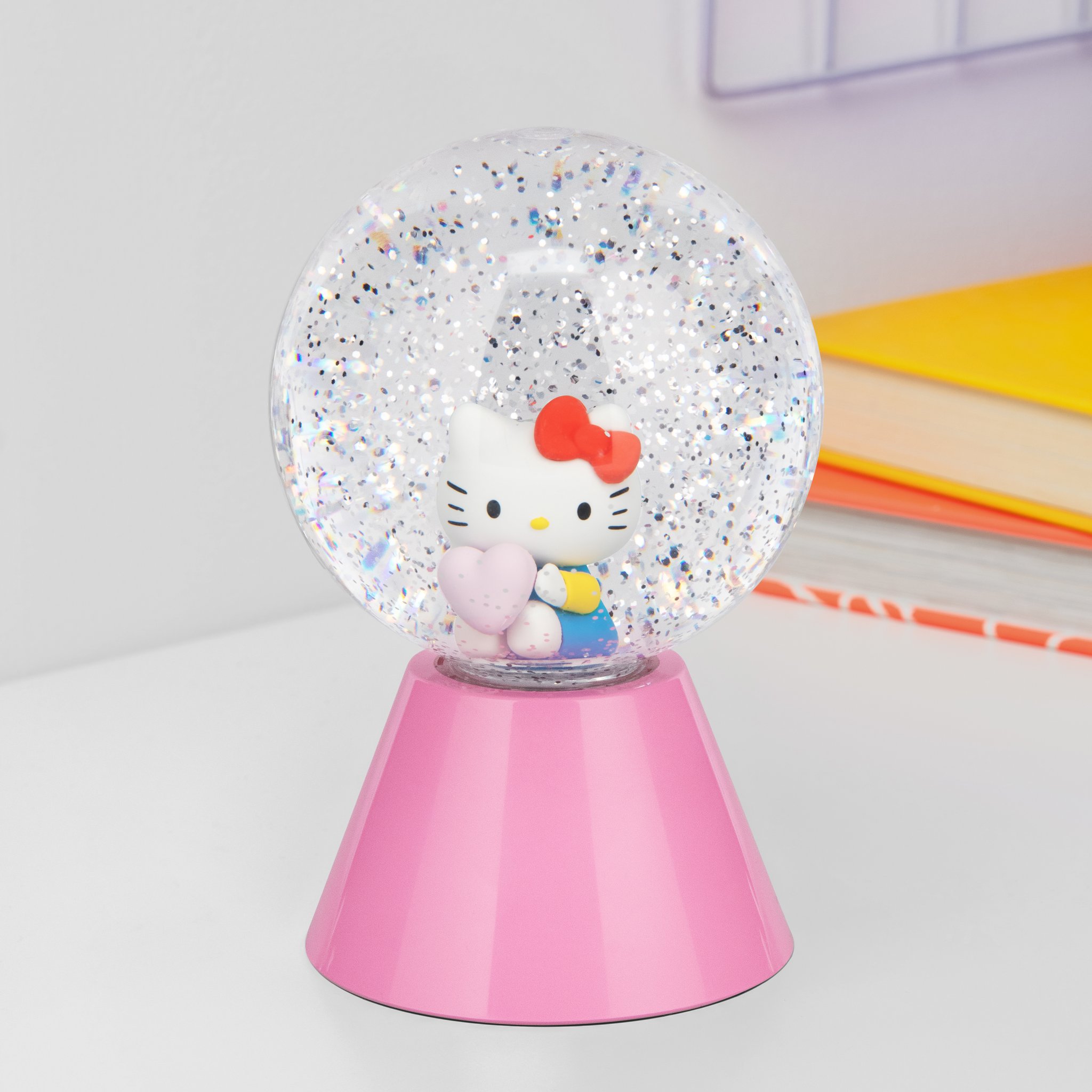Hello Kitty glitter ball lamp on a desk