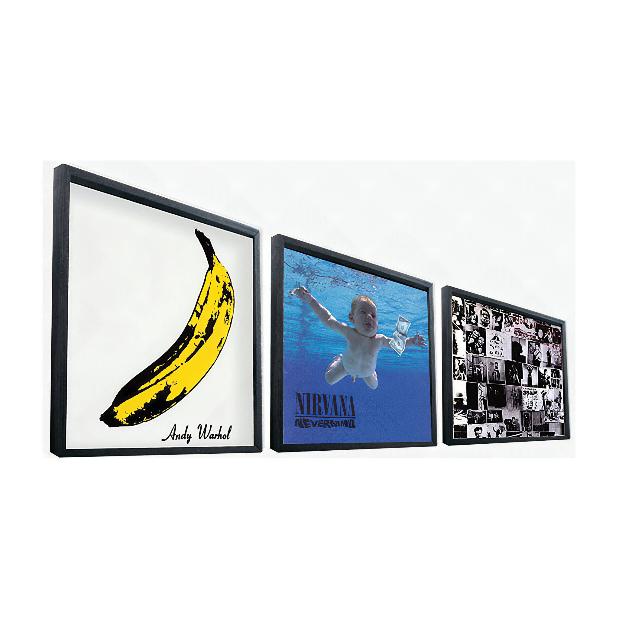 Drei Bilderrahmen für Schallplatten an der Wand mit gerahmten Plattencovern